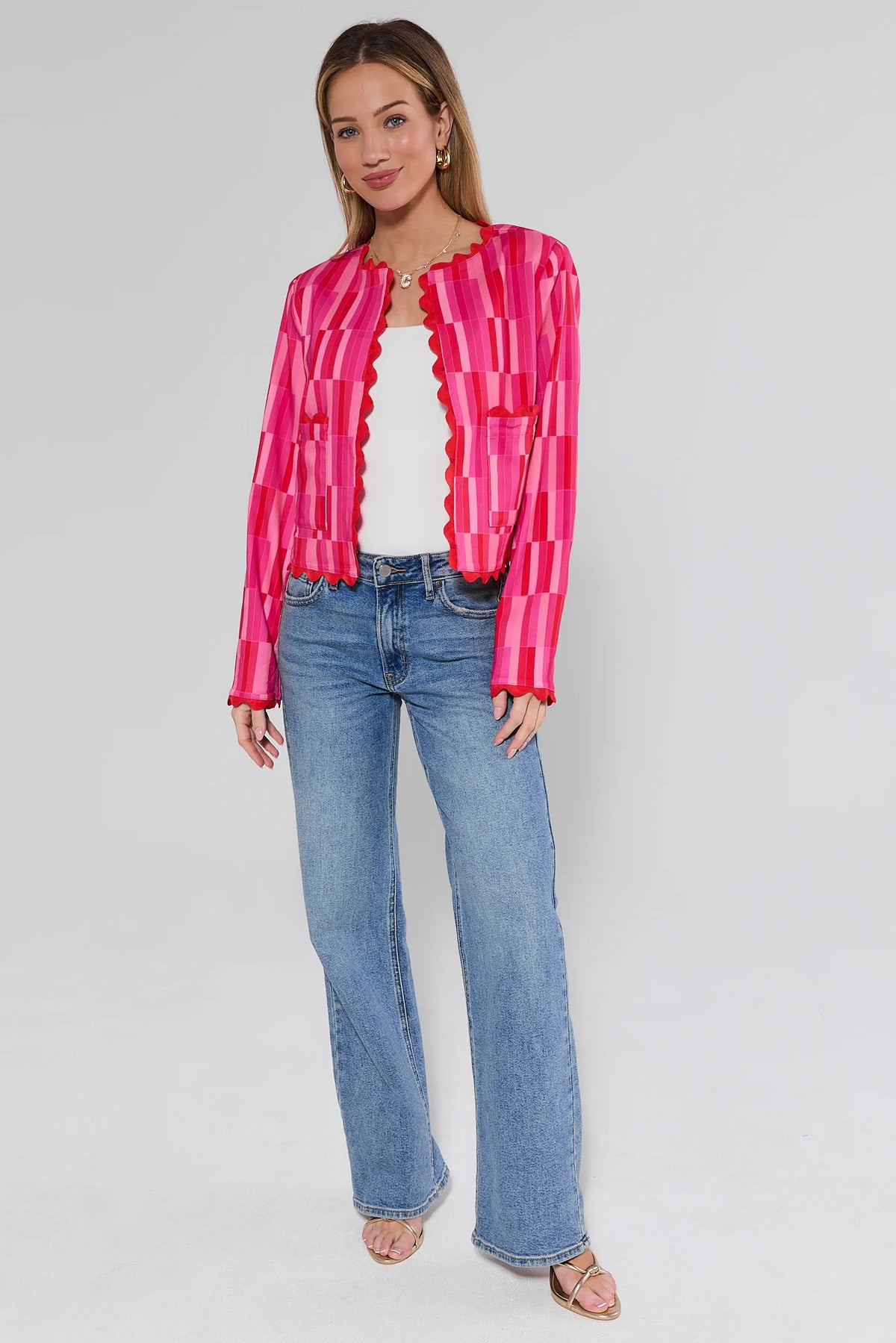 Jesse Pink Printed Scalloped Jacket showing red scallop hem detail with blue jeans - Back View | Avara