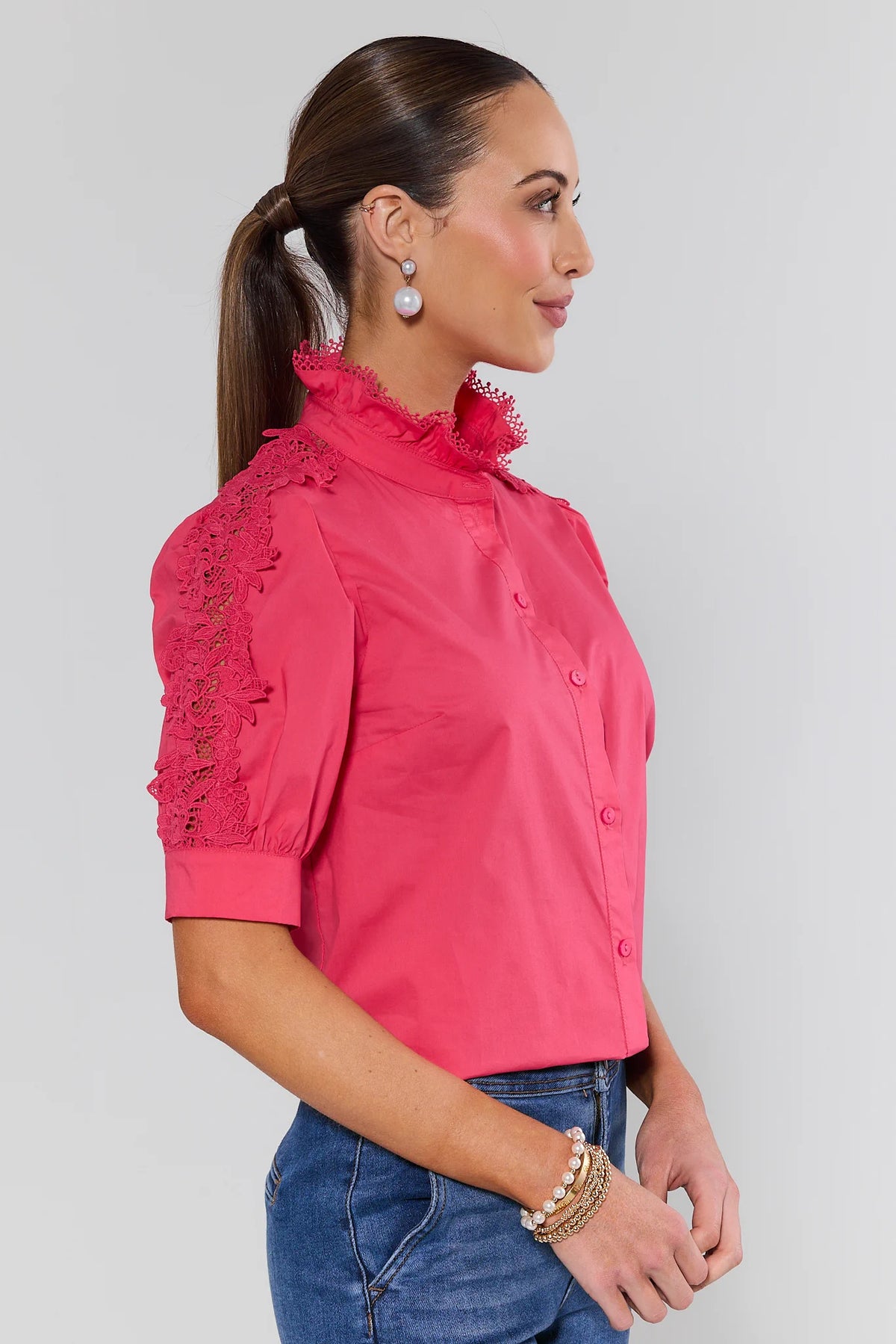 Maribeth Pink Lace Button Up Top side profile showing lace sleeve inset and ruffle neckline | Avara