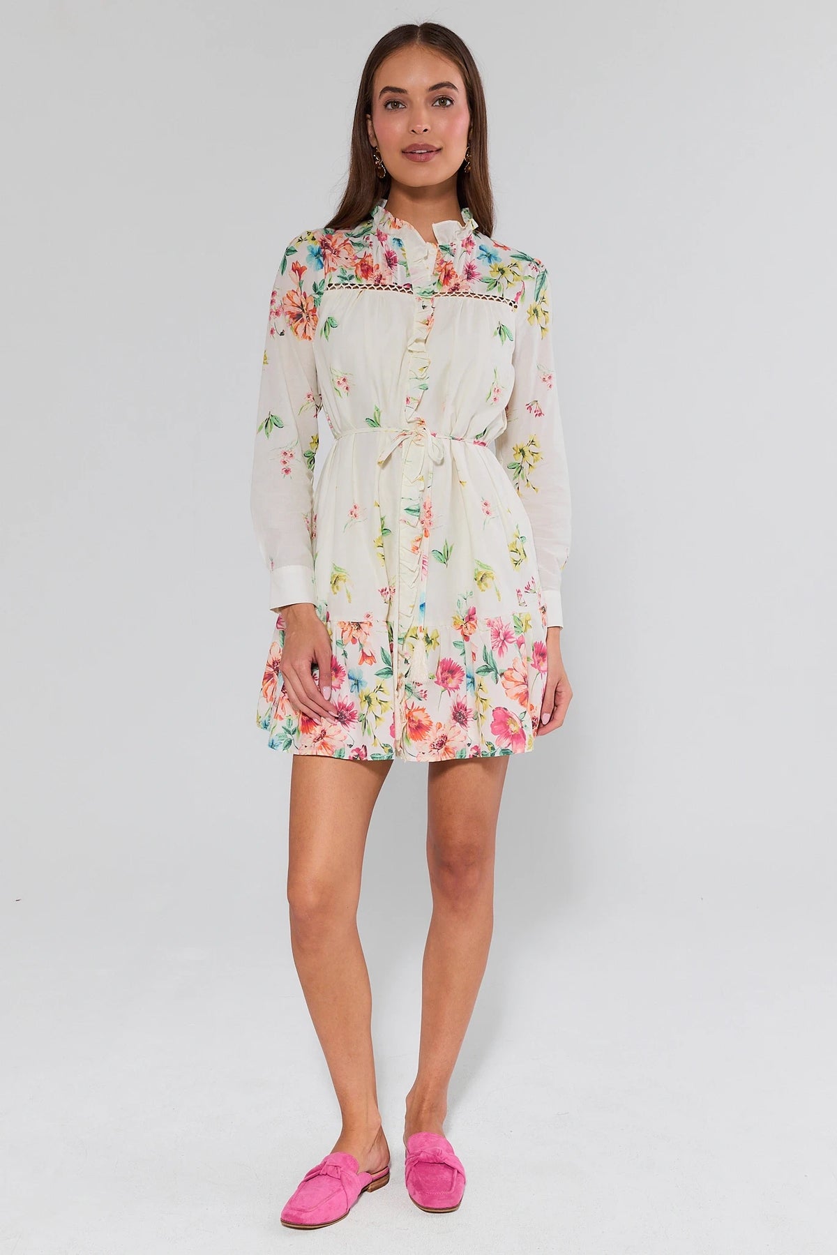 Woman wearing a floral dress on a white background