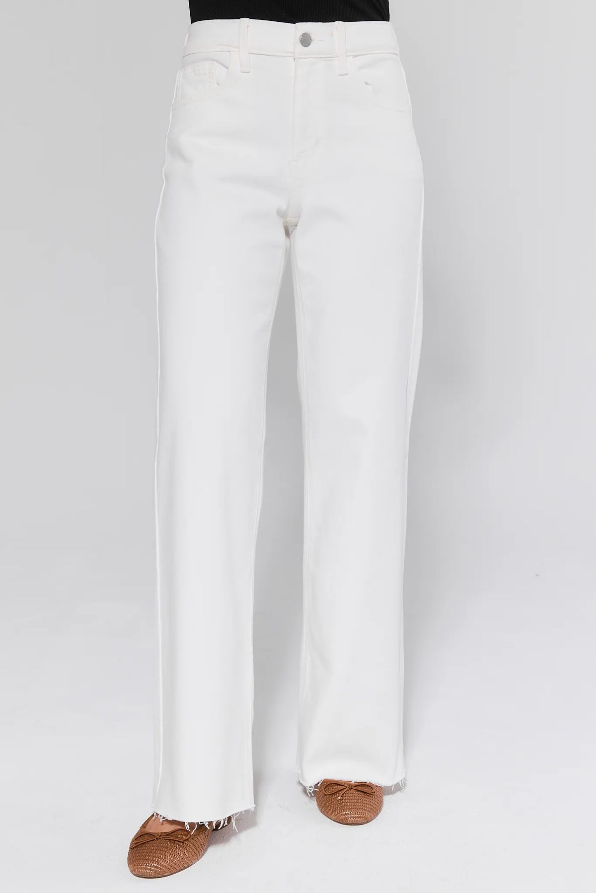 Serena White Straight Leg Jeans, high-rise denim with frayed hem and five-pocket styling, paired with brown woven flats - Front View | Avara