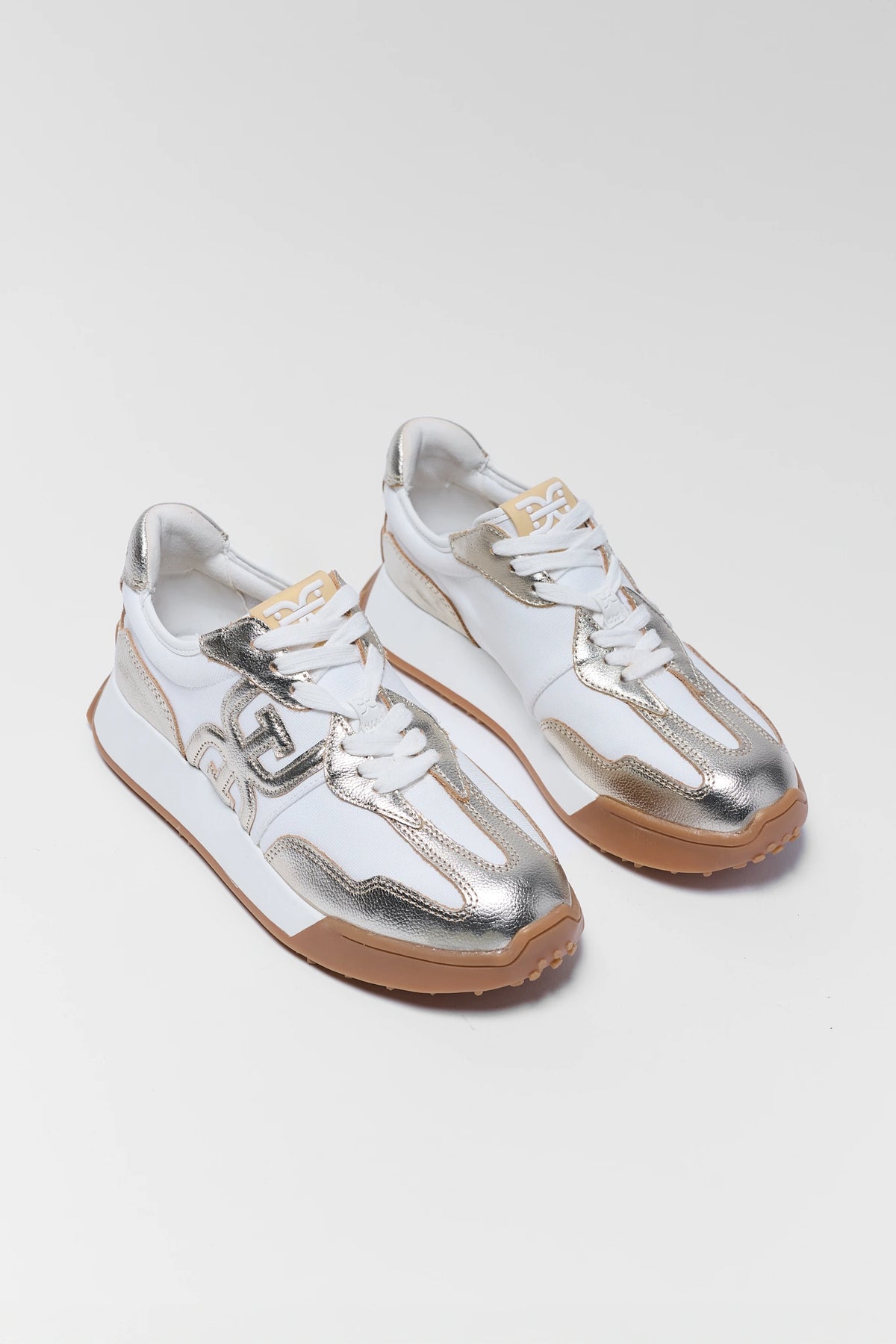 Sam Edelman Langley Gold metallic sneakers pair - white and gold with gum sole - Front Angle | Avara