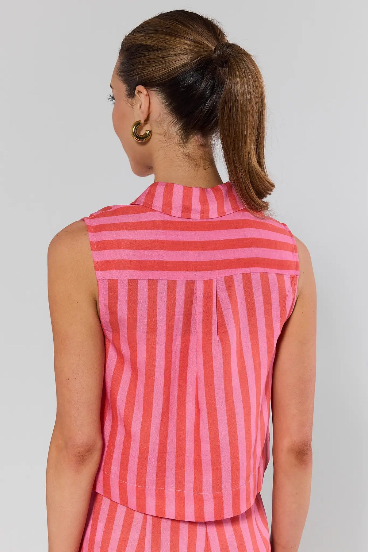 Delilah Pink Striped sleeveless Button Up Top - back view showing yoke detail on model | Avara