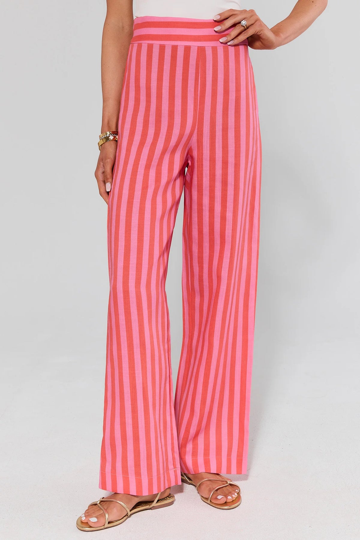 Delilah Pink and Red Striped Wide-Leg Flare Pants - Front View On Model | Avara