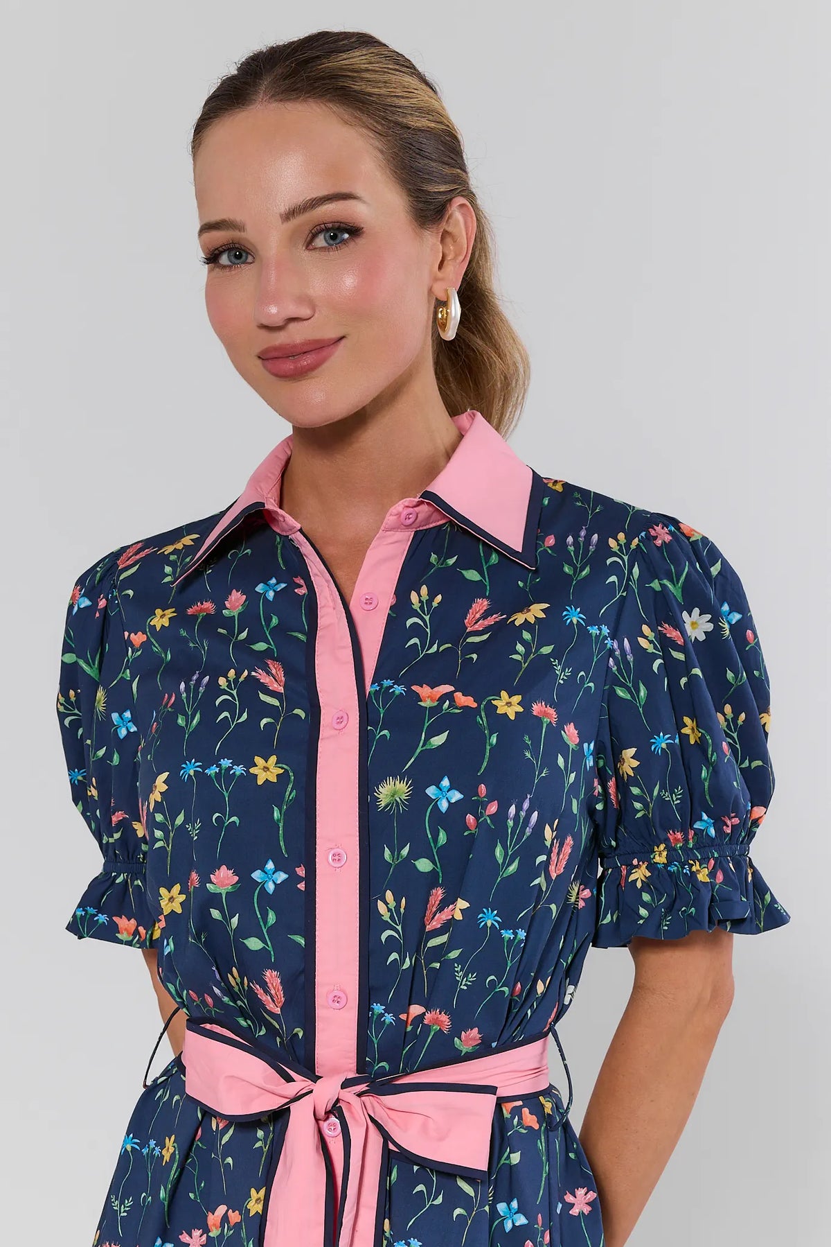 Luna Floral Button Up Short Dress navy with pink contrast collar and puff sleeves - Close-Up Detail | Avara
