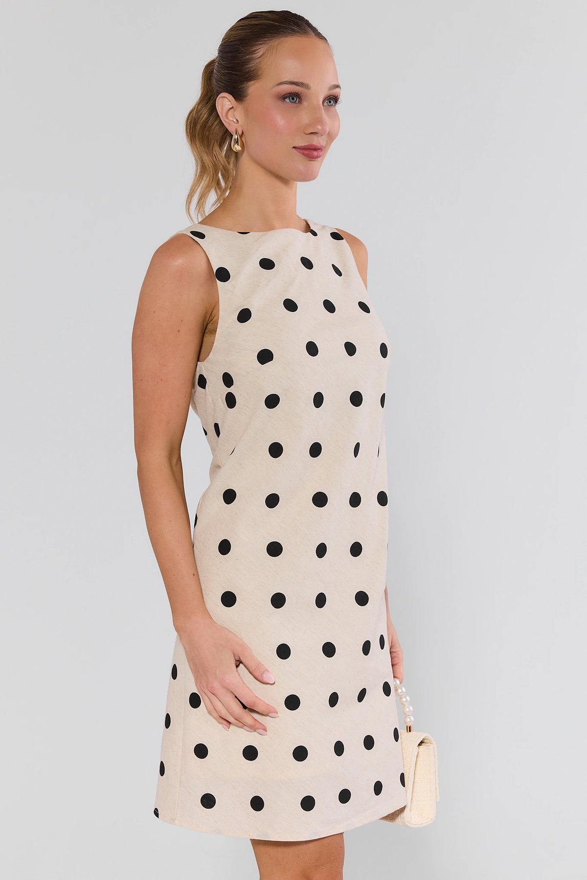 Cream and black polka dot short dress with V-back detail - Side Angle Full Length | Avara
