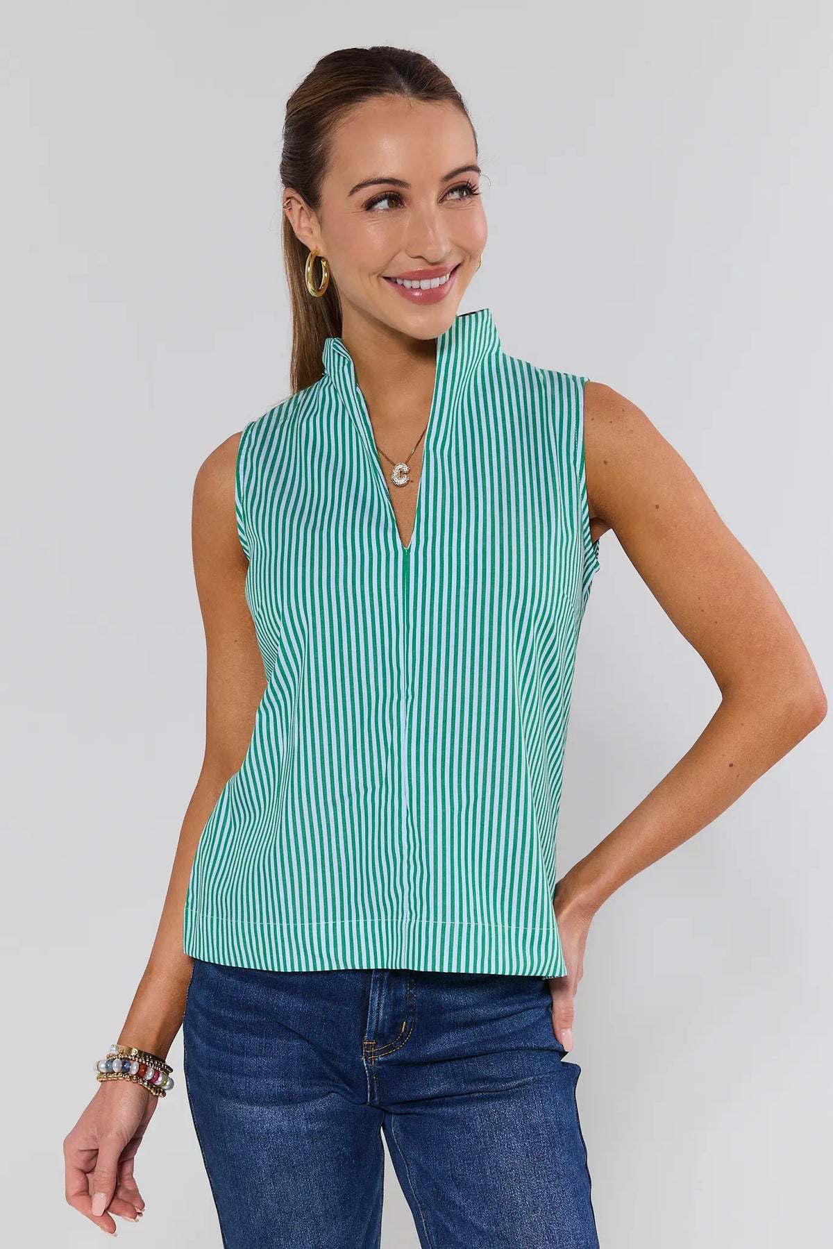 Ellie Green Striped Sleeveless Top styled with blue jeans - Front View | Avara