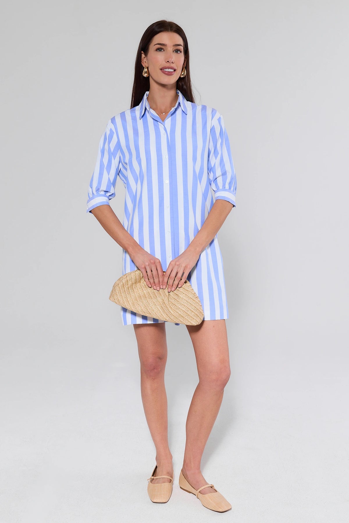 Colby Blue Striped Short Dress full-length view styled with woven clutch and nude flats | Avara