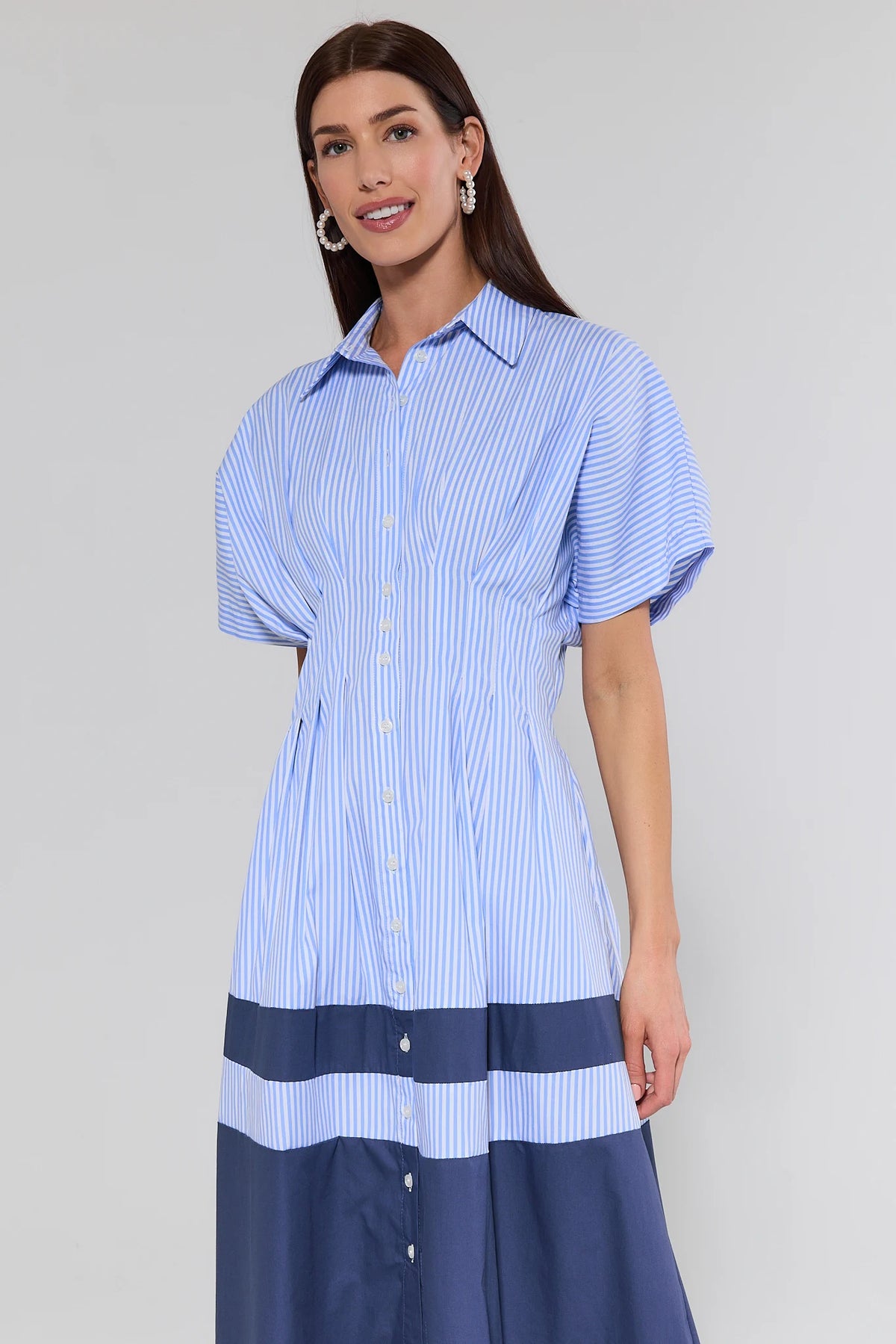 Diana Blue Striped Maxi Dress - Side Angle Close-Up, fitted bodice and navy colorblock skirt | Avara