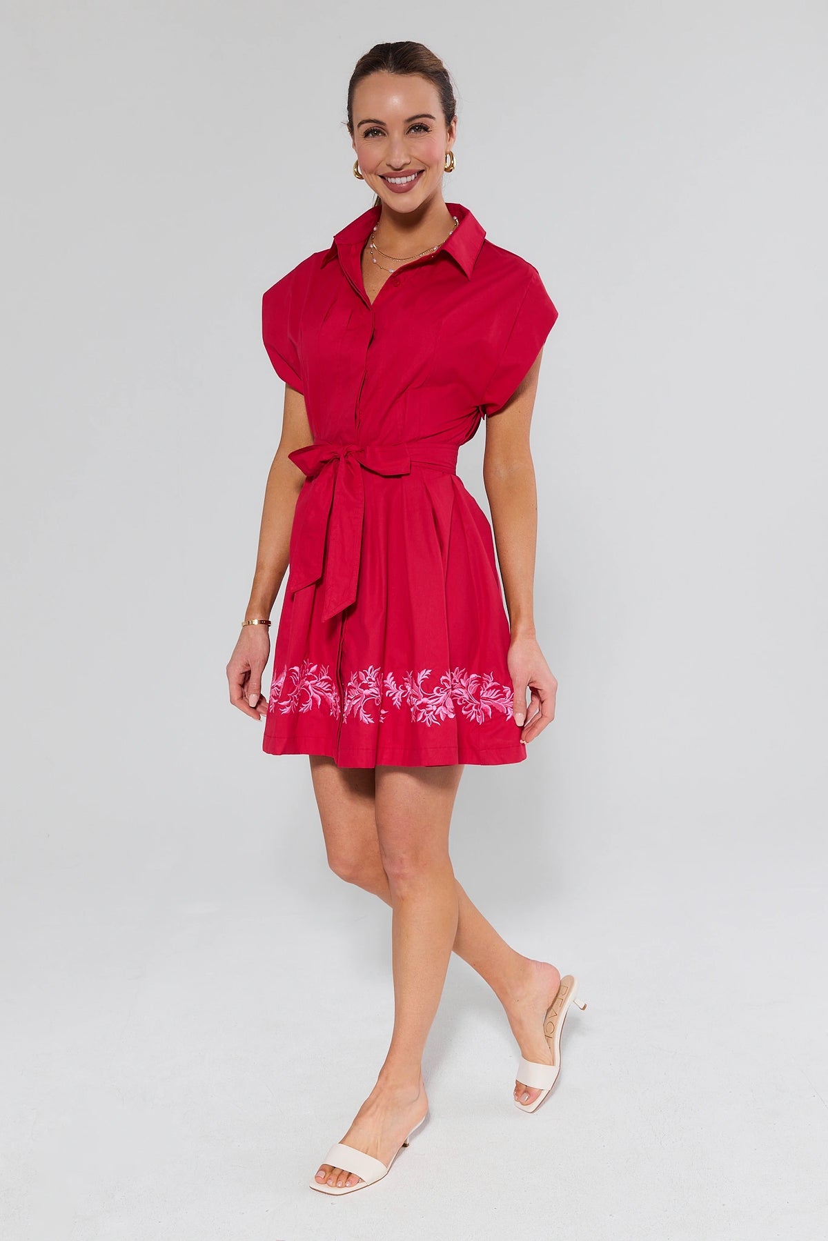 Woman in red embroidered short dress with white heels - Full Length Front View | Avara