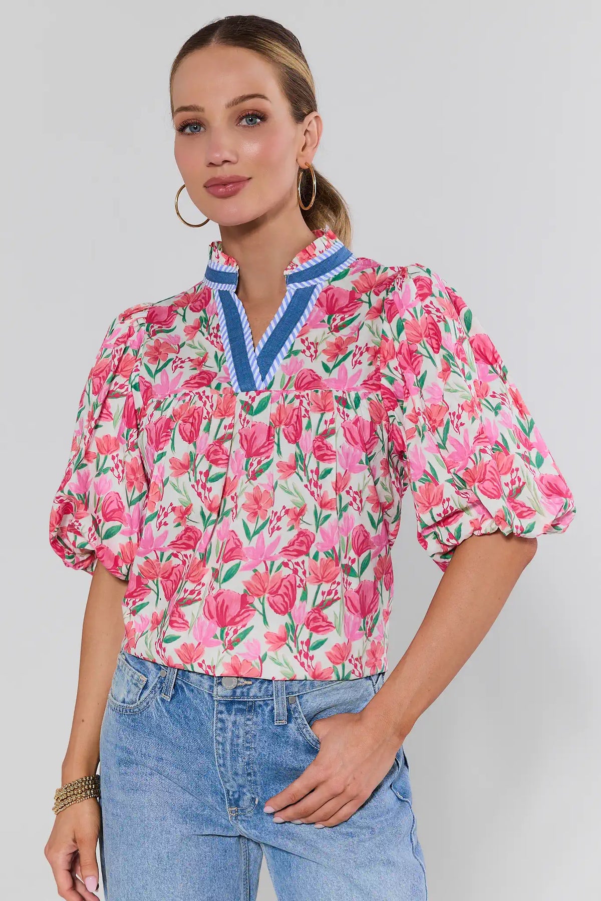 Pink Floral Puff Sleeve Blouse with Blue V-Neckline Trim - Front View On Model | Avara