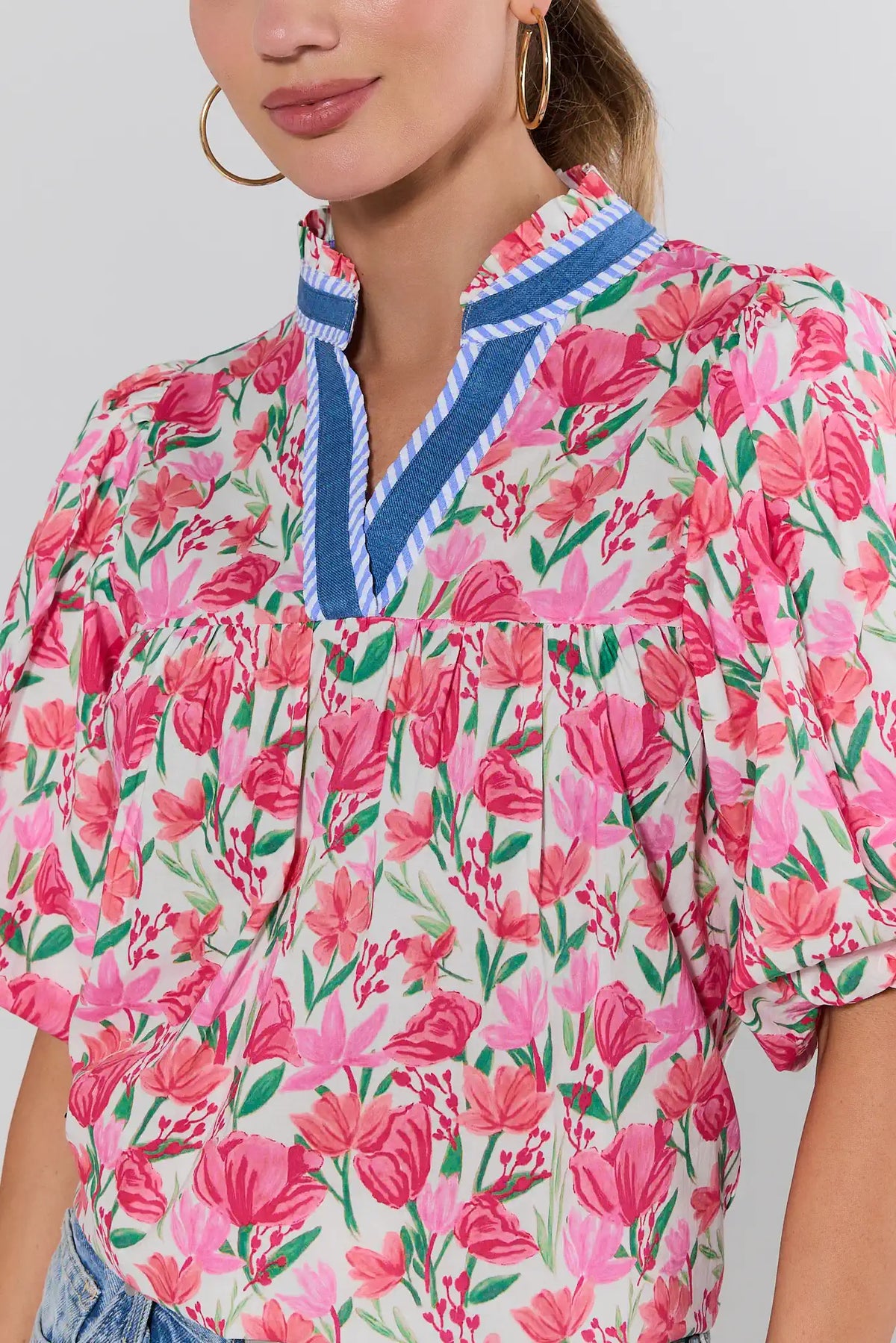 Pink Floral Print Blouse with Blue Striped V-Neck - Close-Up Neckline Detail | Avara