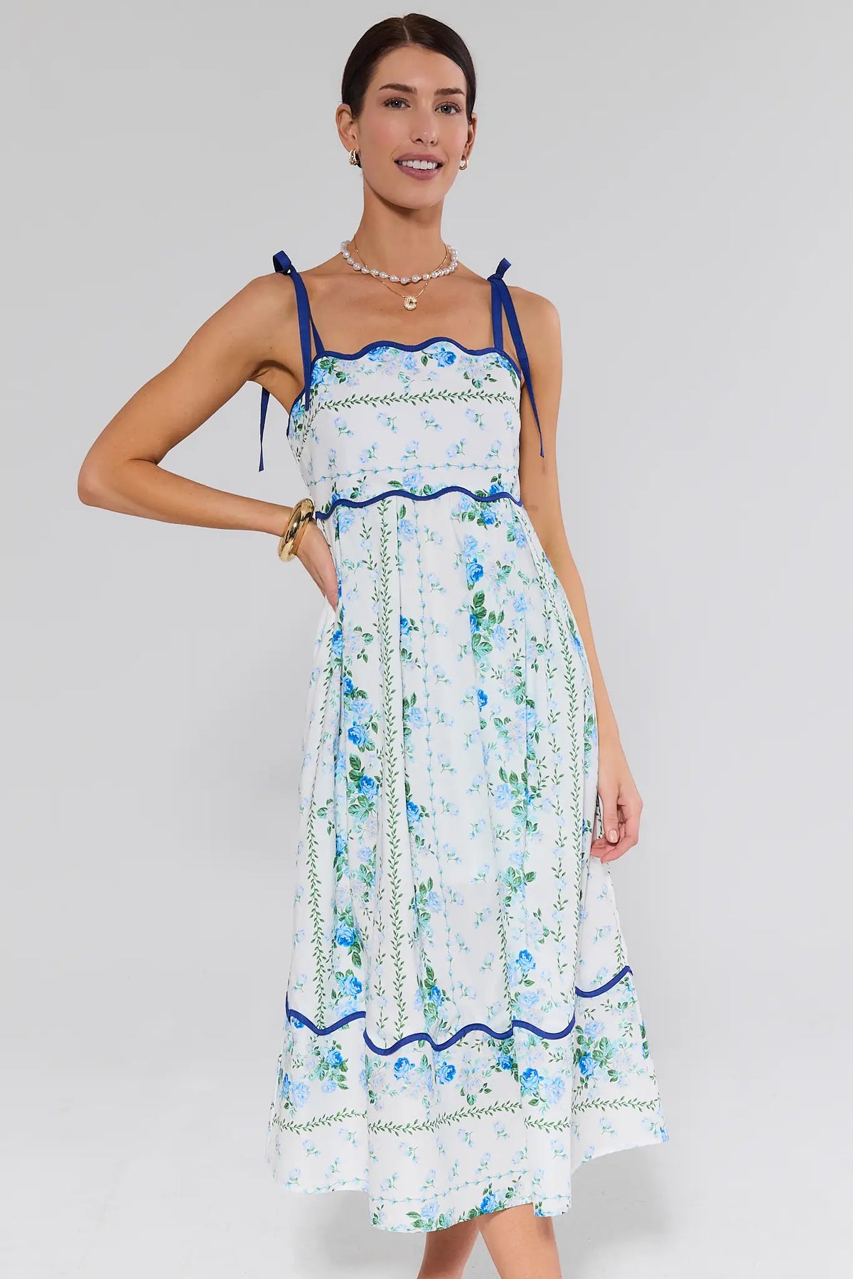 Flora Blue Floral Print Midi Dress full-length front view, flowy A-line skirt with scalloped hem | Avara