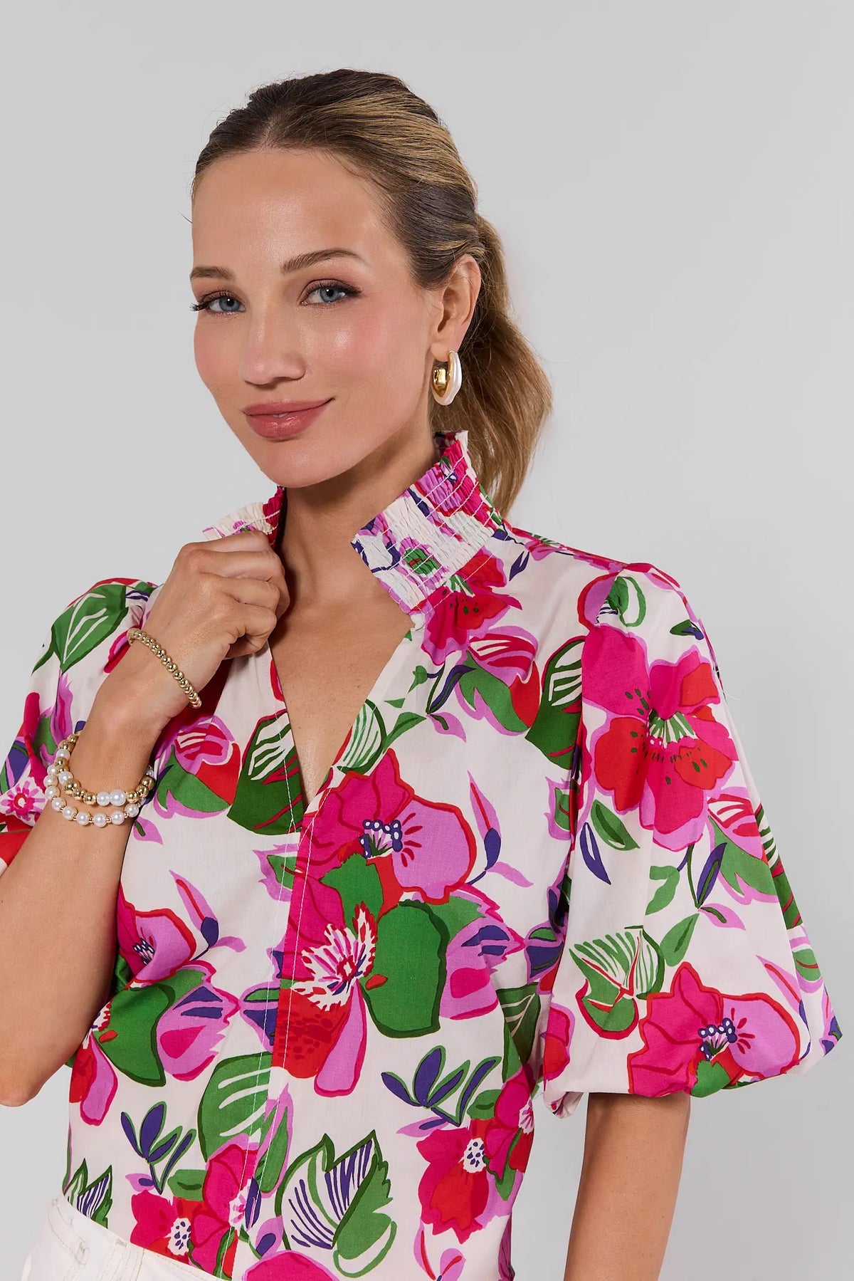 Genevieve Cream Floral Print Top by THML - smocked collar close-up, puff sleeve detail, gold hoops and pearl bracelets - On Model Detail | Avara