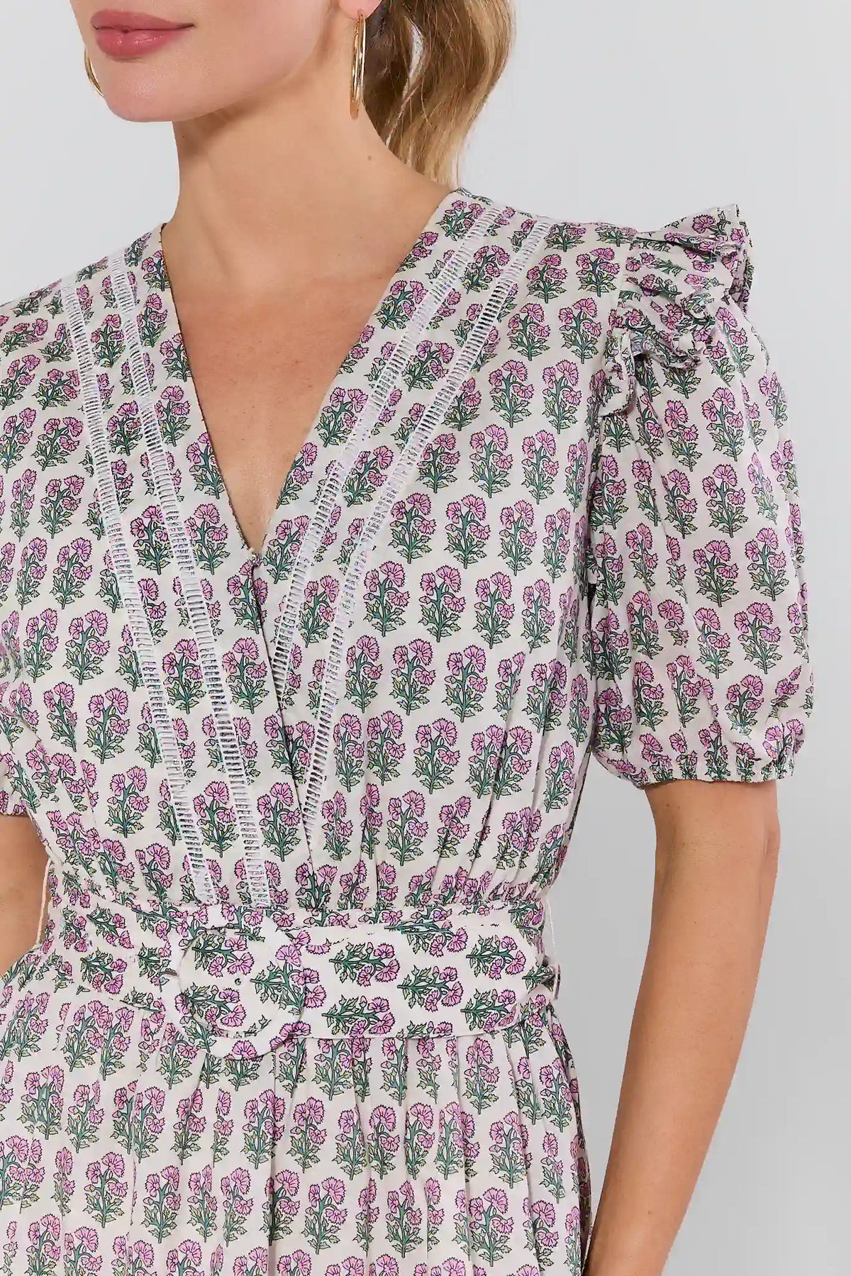Cody White Floral Belted Dress V-neckline and ruffle shoulder close-up detail | Avara