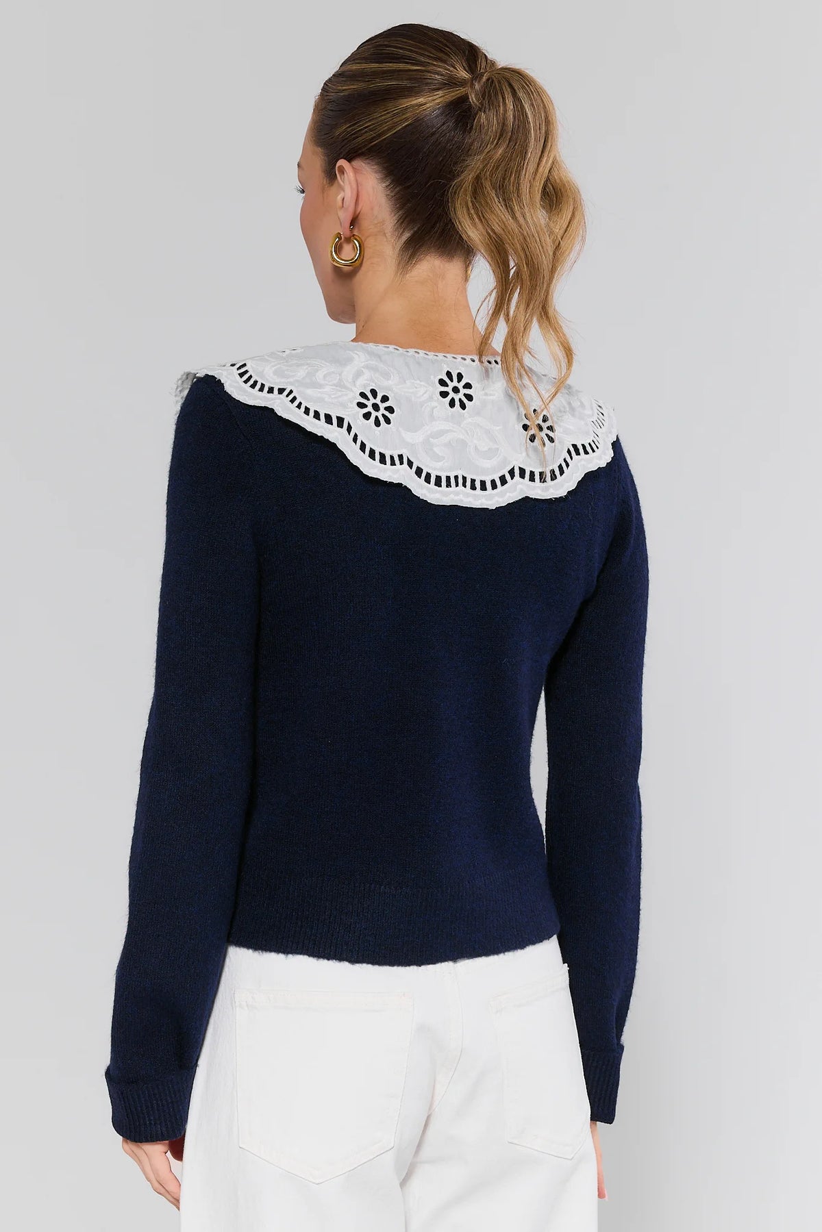 Navy knit eyelet cardigan with white embroidered scallop collar - Back View on Model | Avara