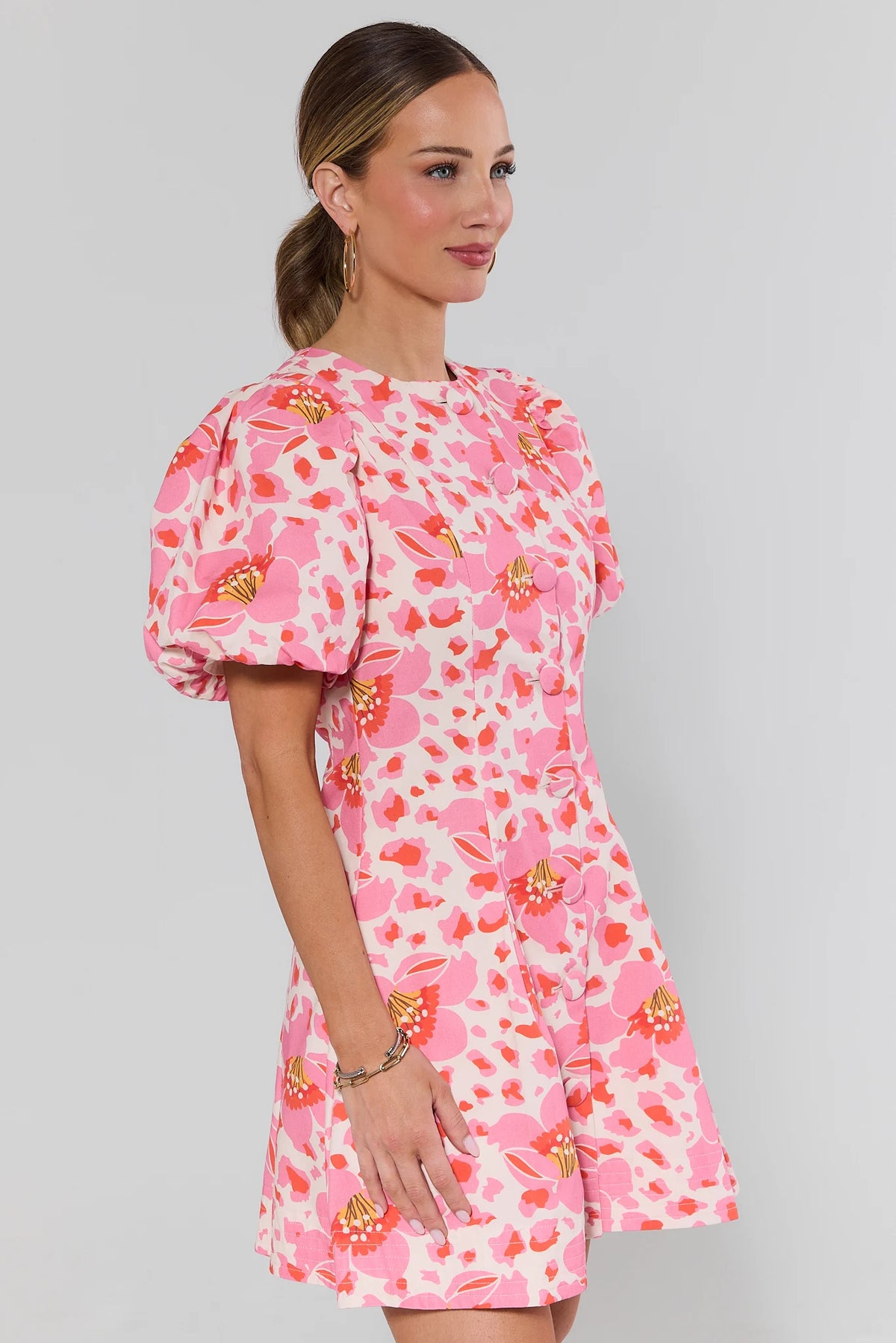 Ruth Pink Floral Print Short Dress side profile showing puff sleeve and A-line skirt | Avara