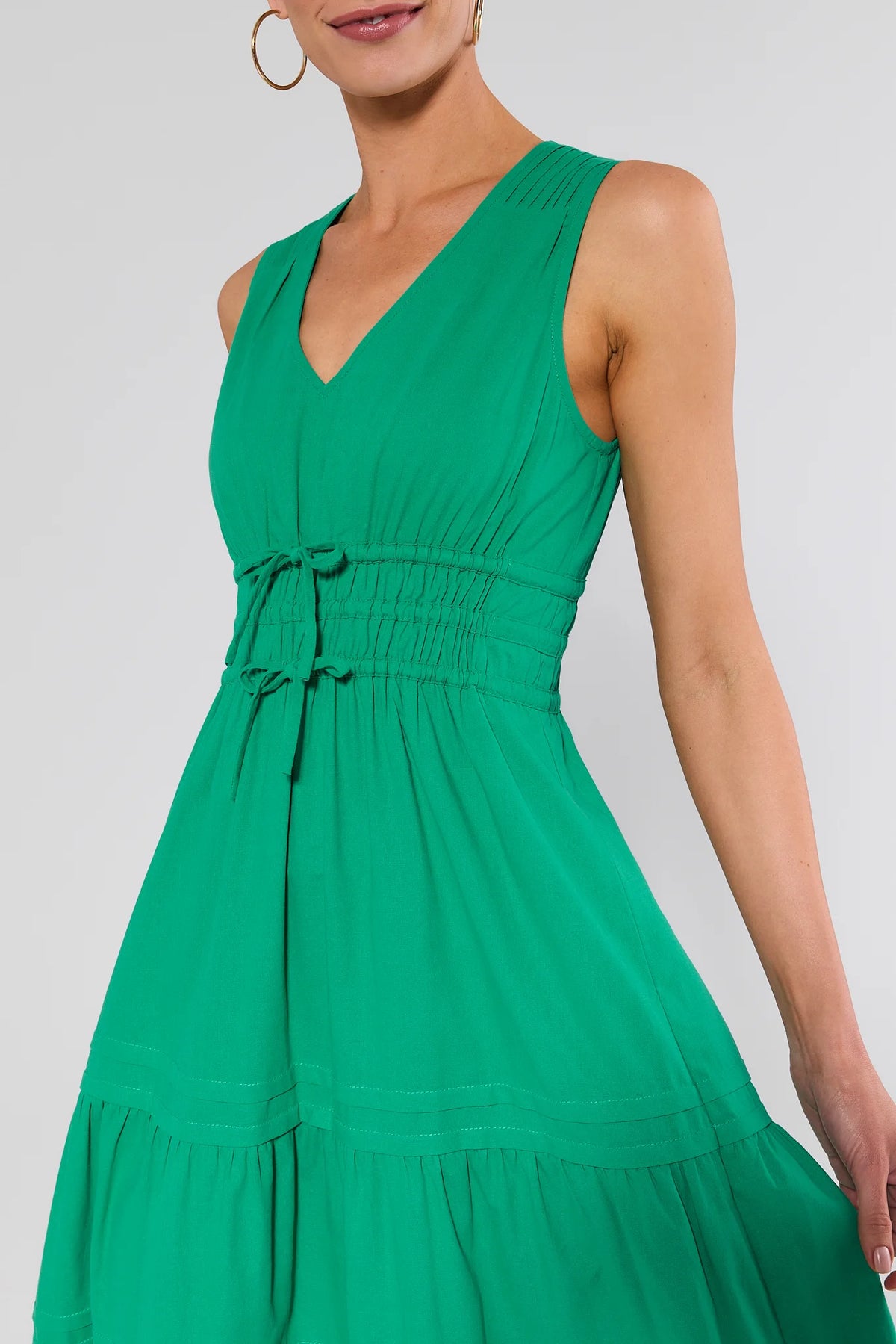 Gwendolyn Green Tiered Maxi Dress - Close-Up of Smocked Waist and V-Neckline Detail | Avara