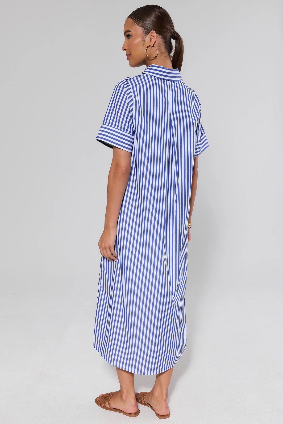 Juniper Blue Striped Midi Dress back view showing midi length and short sleeves | Avara