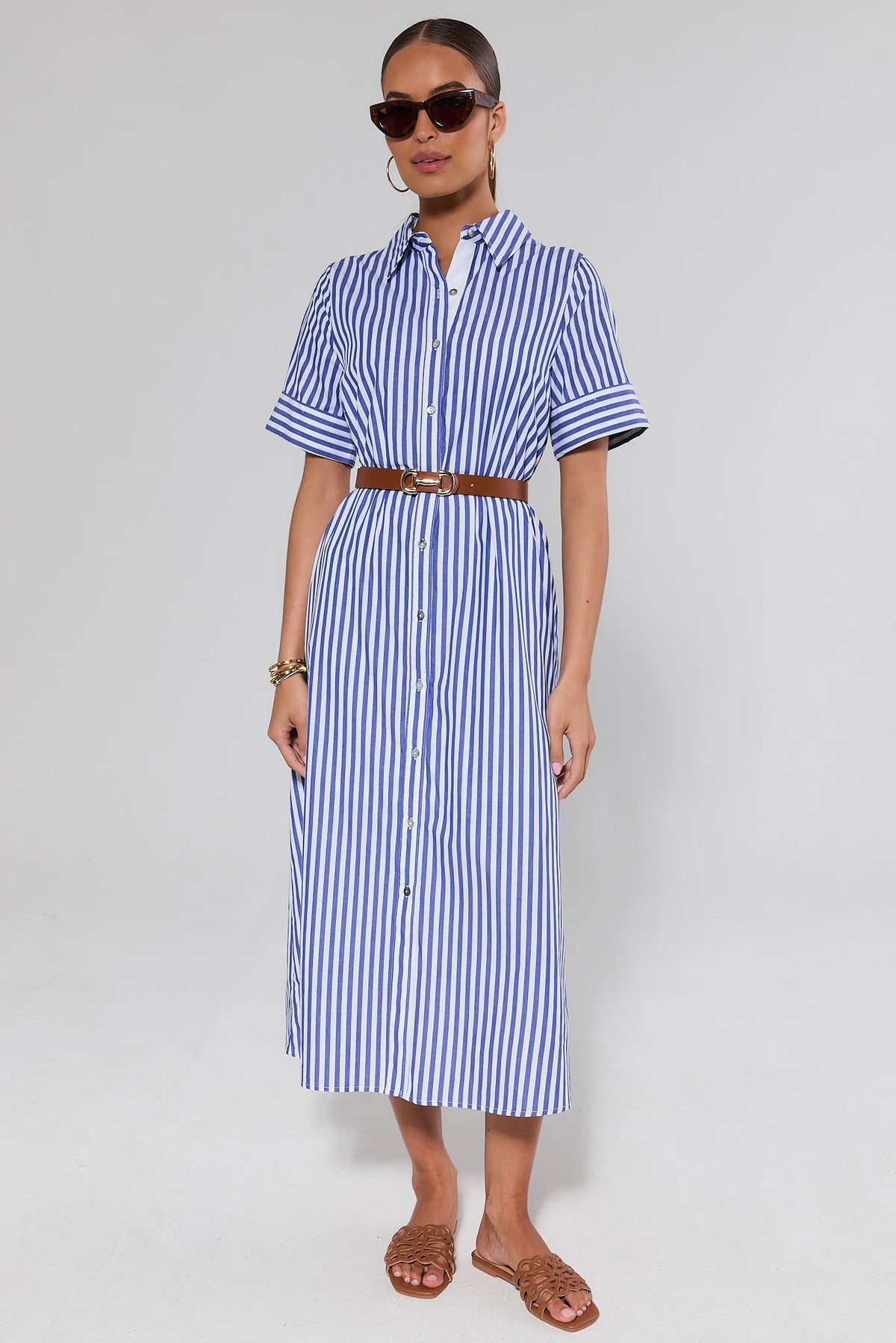 Juniper Blue Striped Midi Dress styled with brown belt and sandals, full-length front view | Avara