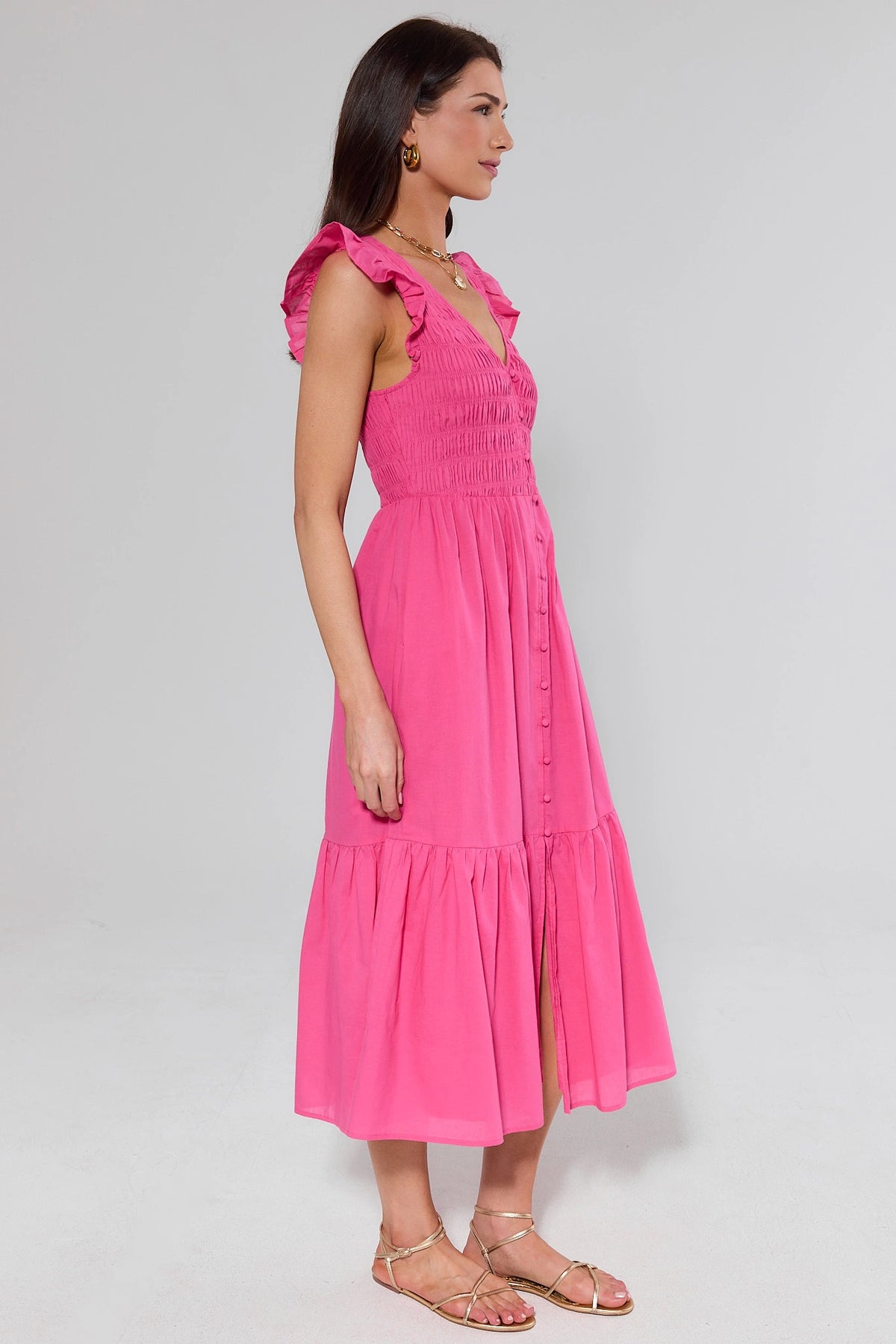 Allyn Pink Smocked Midi Dress side profile showing button-front and tiered midi hem | Avara