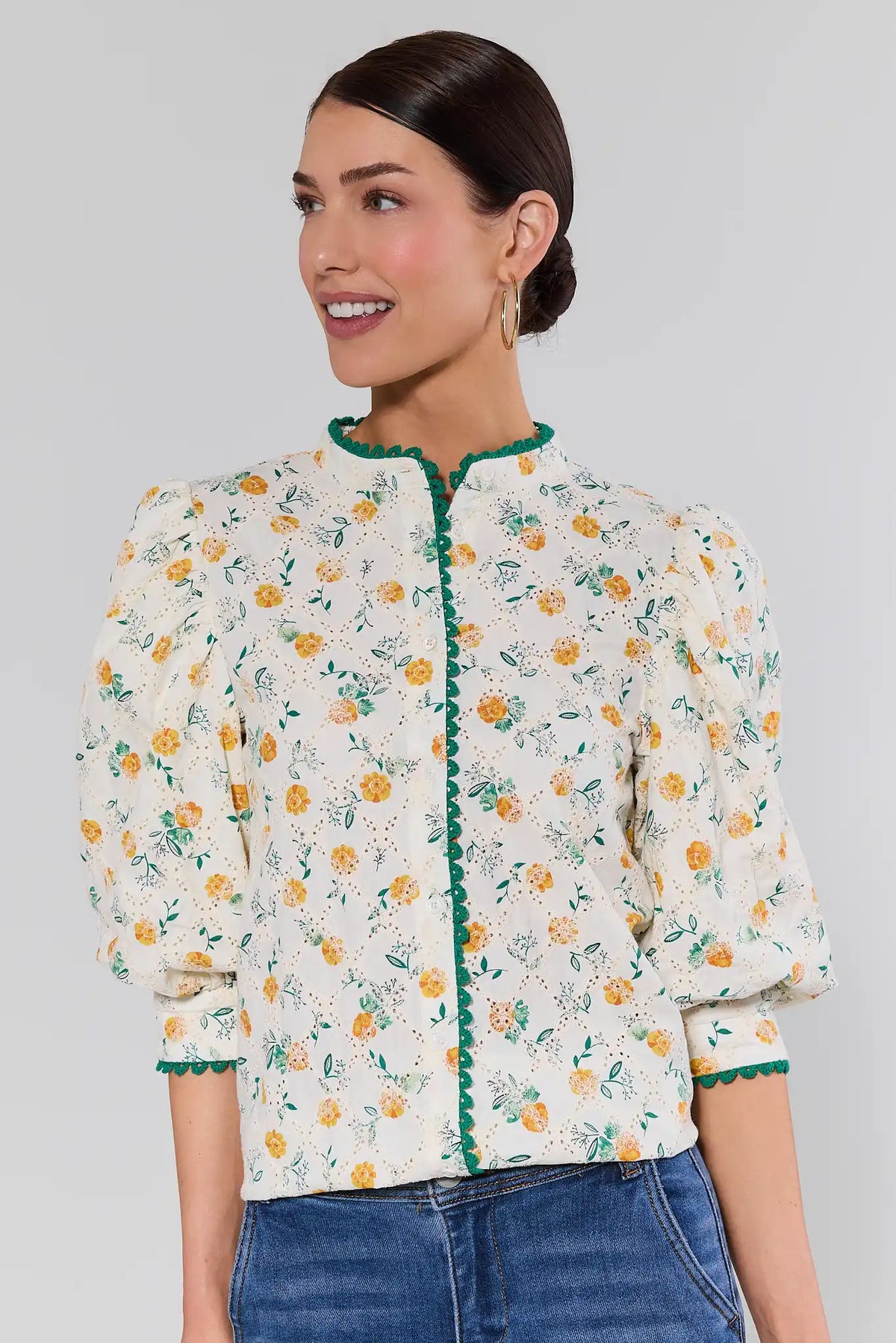 Cece Ivory Floral Eyelet Top with green trim and puff sleeves - Front View | Avara