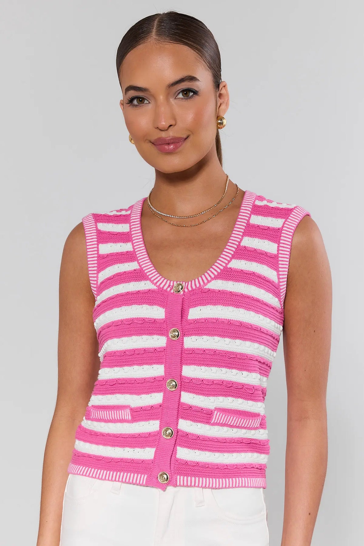 Pink and white striped knit vest with gold buttons and scoop neckline - Front View | Avara