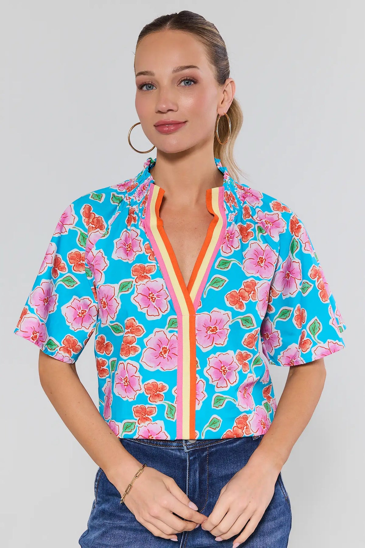 Macey Blue Floral Print Top by THML - Front View, colorful floral top with striped trim | Avara