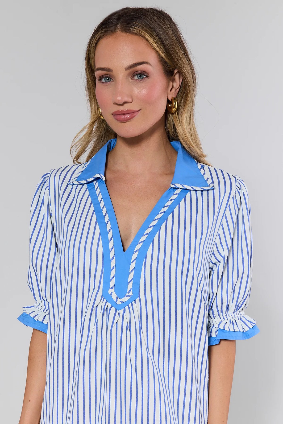 Ainsley Blue Striped Short Dress - Close-Up Neckline & Ruffle Sleeve Detail | Avara