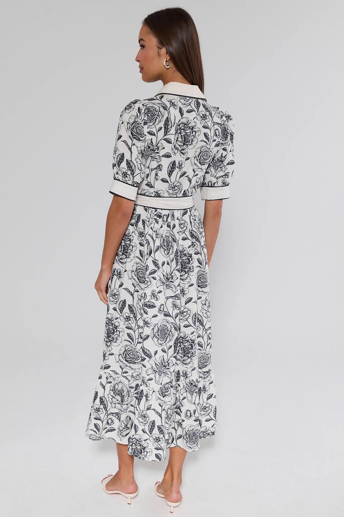 Caitlyn Navy Floral Print Midi Dress - Back View, Elbow-Length Sleeves and Tiered Hem | Avara