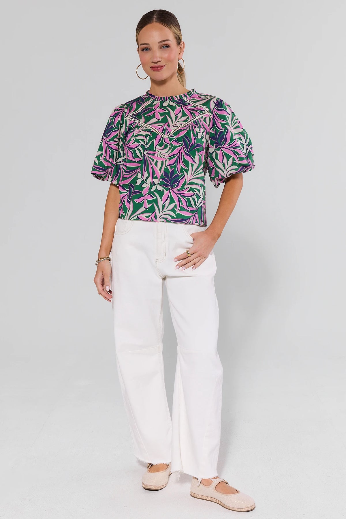 Kristen Green Palm Printed Top styled with white wide-leg jeans - Full Length Front View | Avara