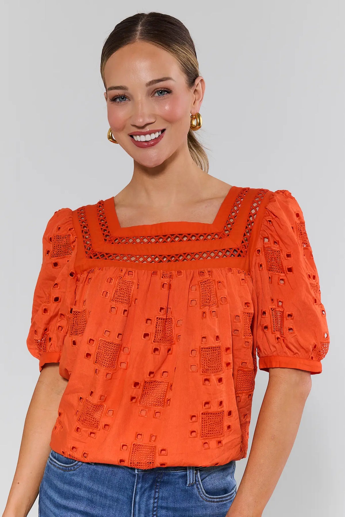Orange Eyelet Square Neck Top with puff sleeves, front crop view on model | Avara