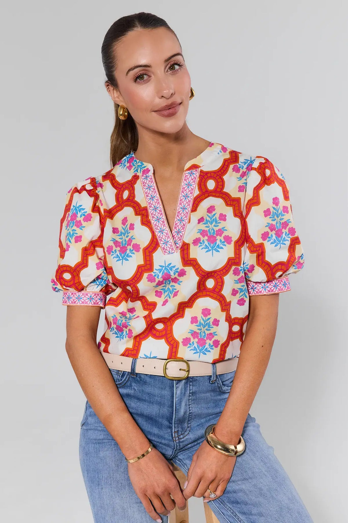 Lucille Ivory Faux Leather Belt styled with blue jeans and printed top - On Model | Avara