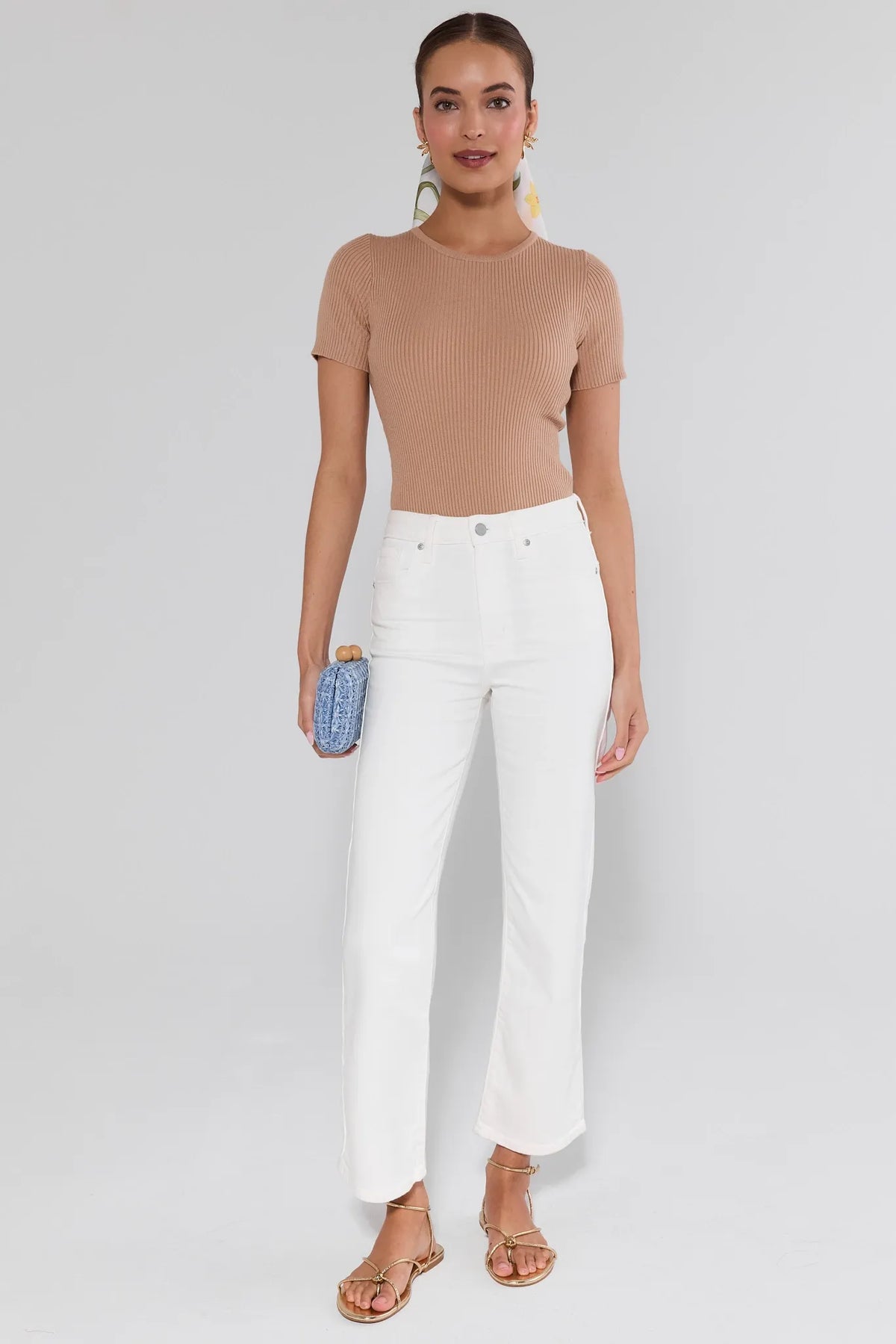 Tara White Straight Leg Ankle Jeans styled with tan ribbed tee and blue clutch - Full Outfit View | Avara