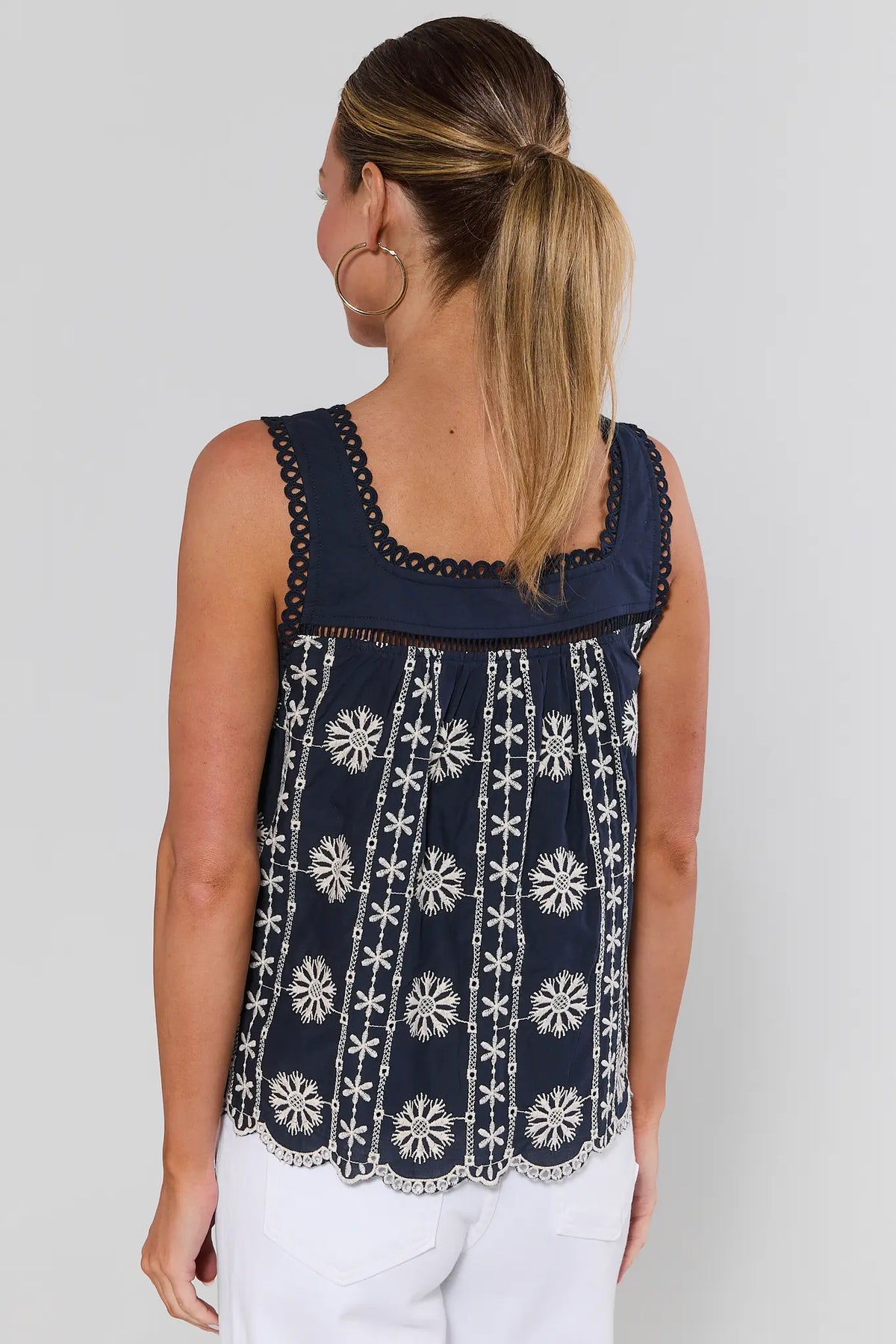 Navy womens embroidered tank top with cream floral eyelet and scallop hem - Back View | Avara