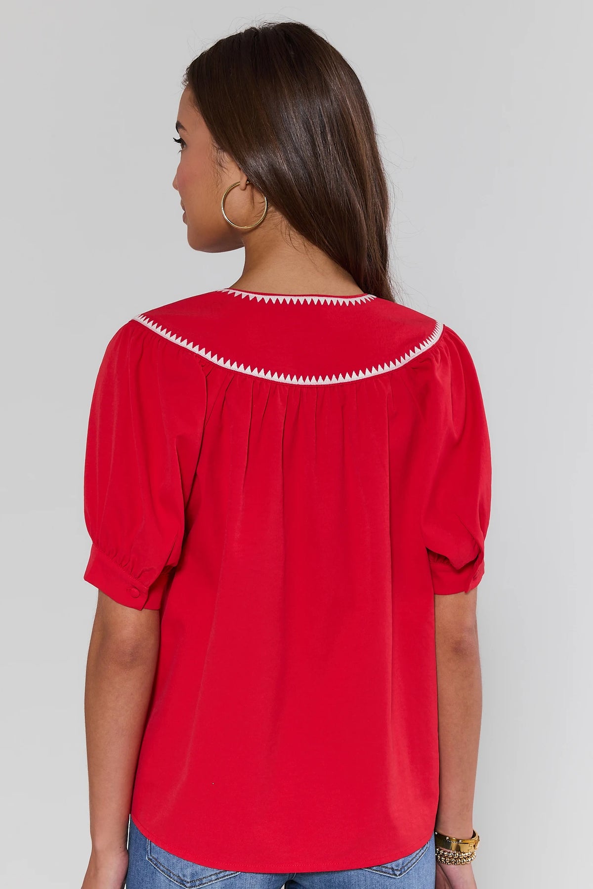 Gabriela Red Stitched Trim Top back view showing whipstitch yoke detail and puff sleeves | Avara