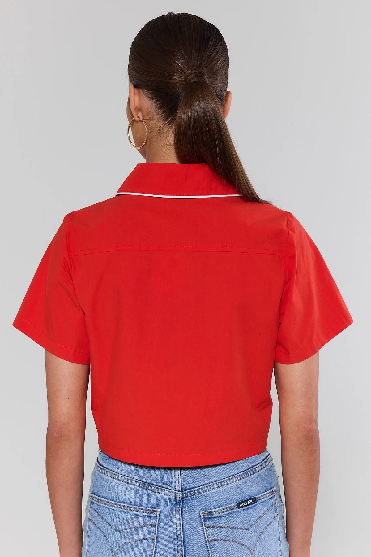 Belle Red Contrast Trim Top back view showing cropped hem, collar piping detail, and short sleeves | Avara