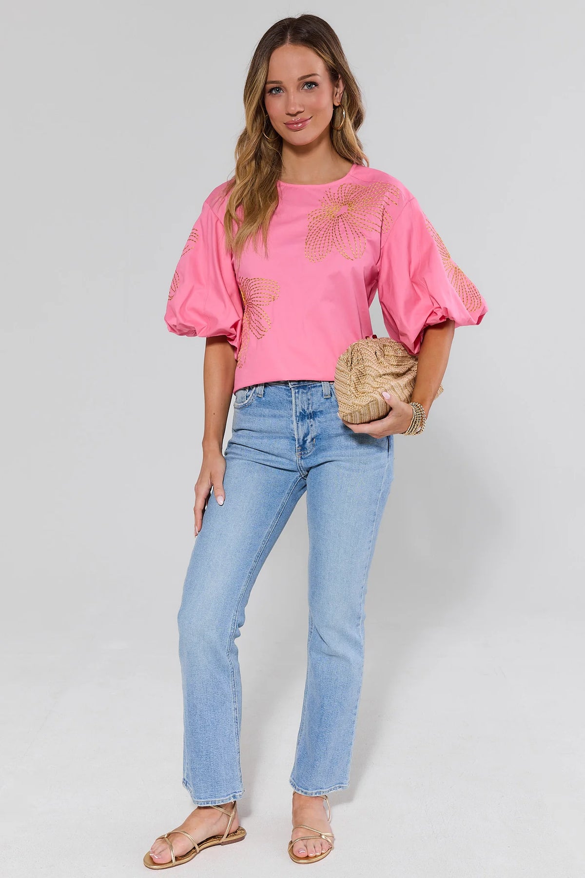 Pink Tara Embroidered Top with jeans and rattan clutch, full-length styled look - On Model | Avara