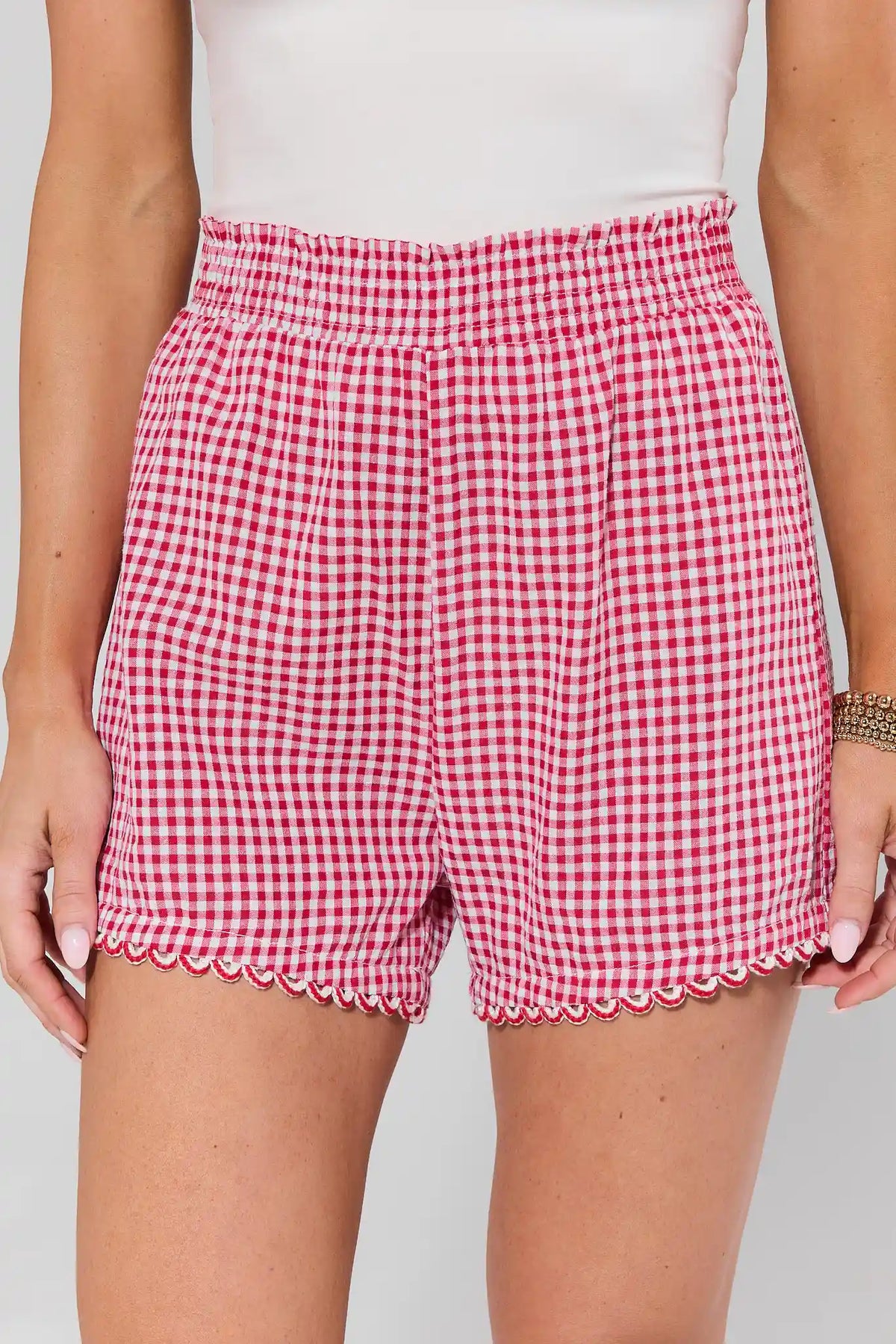 Red Gingham Mini Shorts with scalloped ric-rac hem and smocked elastic waist - Close-Up Front Detail | Avara