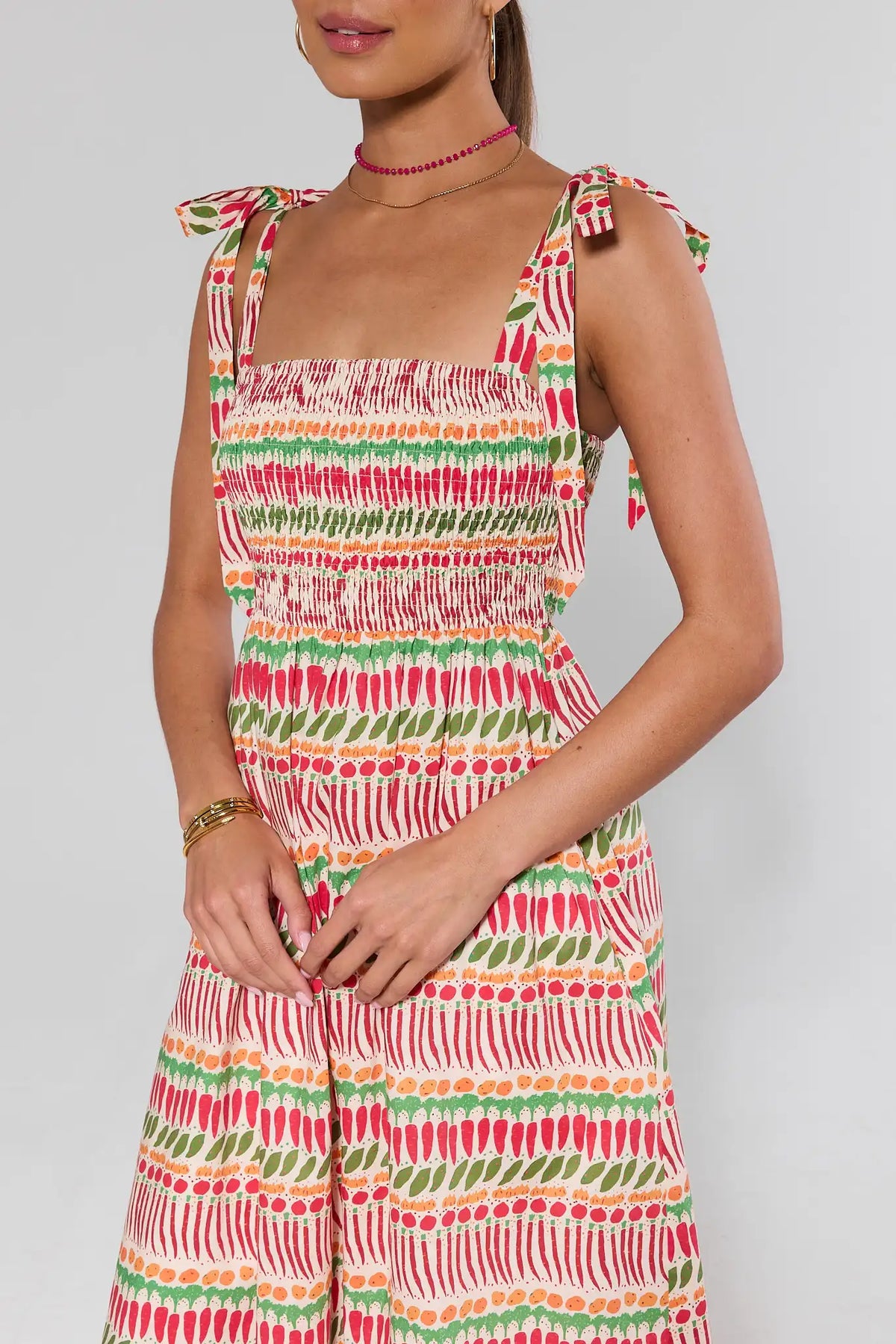 Close-up smocked bodice detail of Multi-Printed Maxi Dress with tie shoulder straps | Avara