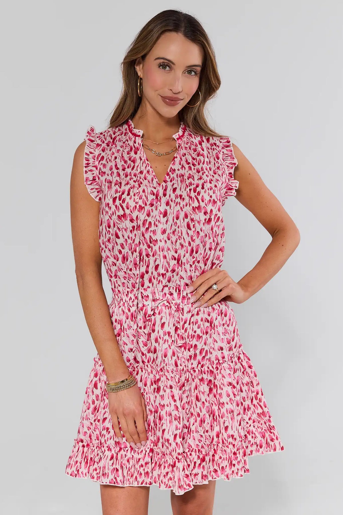 Pink printed short dress with ruffle trim neckline and tiered skirt - Front View | Avara