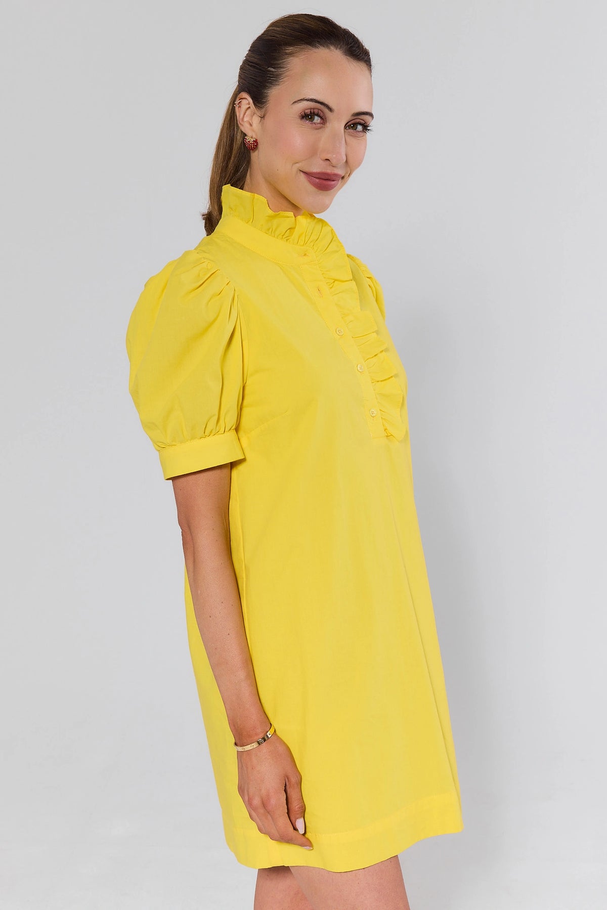 Yellow Puff Sleeve Short Dress - Side Profile View showing A-line silhouette | Avara