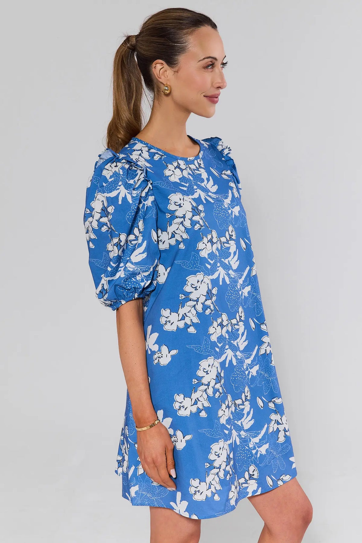 Blue floral puff sleeve short dress with ruffled shoulder detail - Side View | Avara