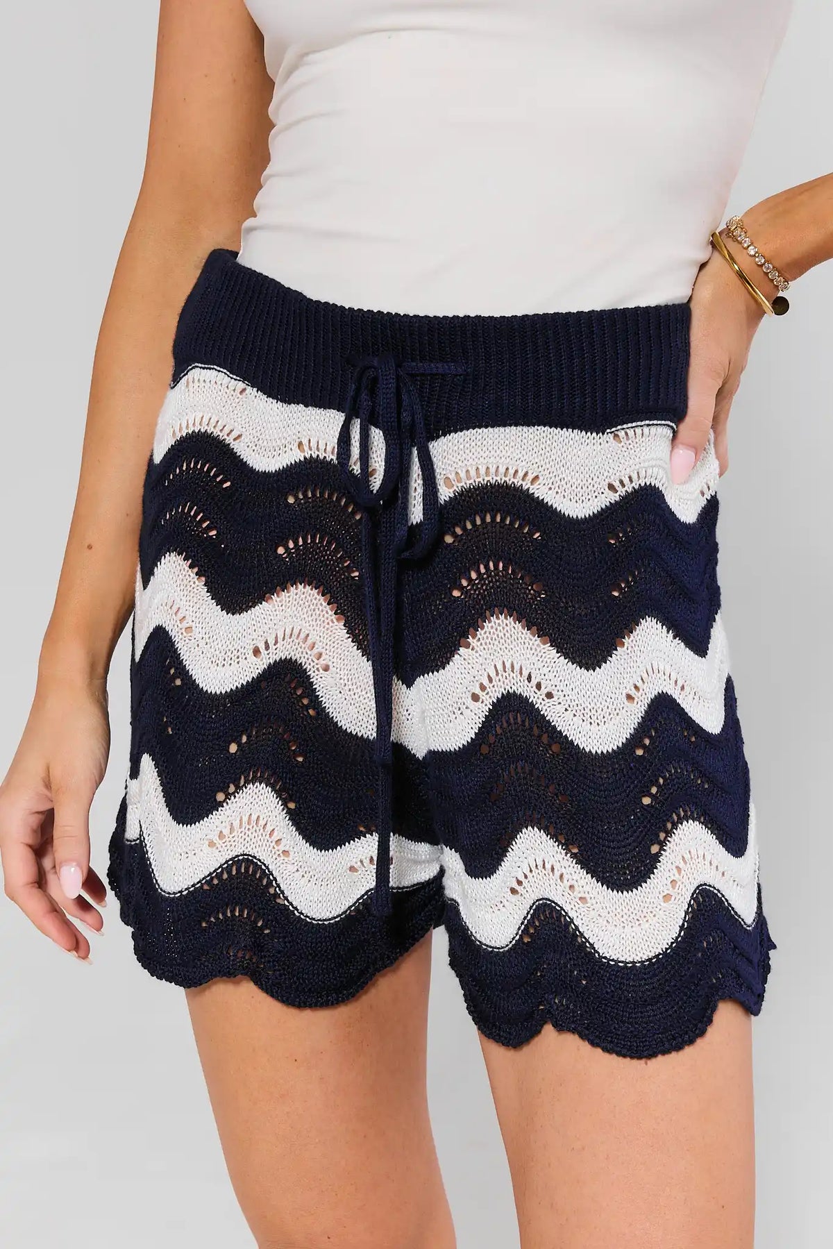 Navy chevron knit shorts with drawstring waist and scalloped hem - Close-Up Front Detail | Avara