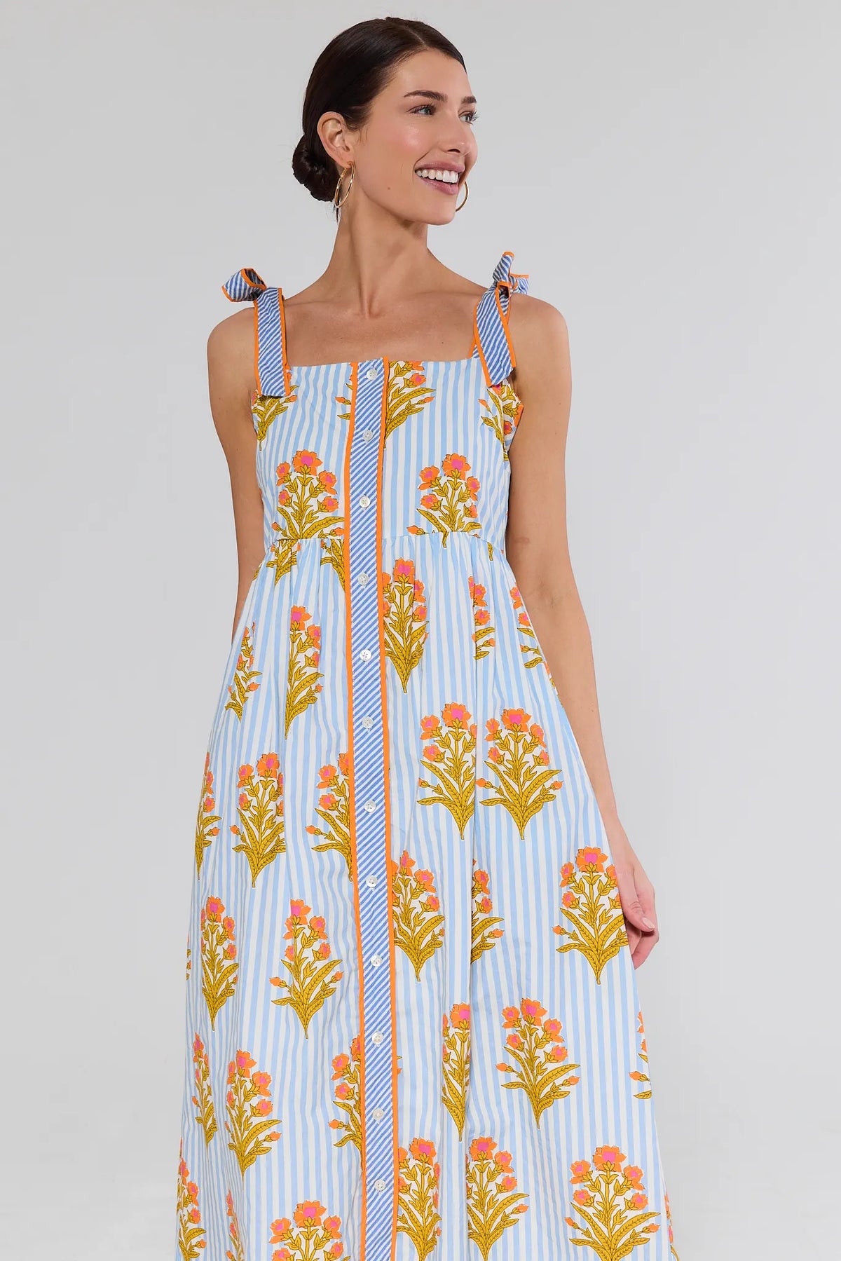 Blue Striped Floral Print Maxi Dress with tie straps, front close-up on model | Avara