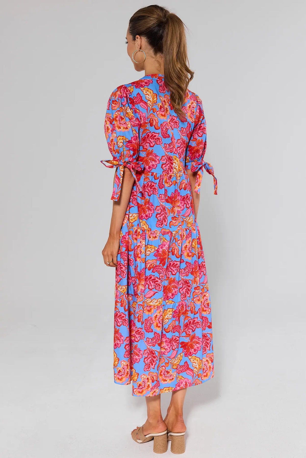 Harriet Blue Floral Printed Midi Dress - Back View, Tie-Cuff Sleeve & Tiered Skirt Detail | Avara