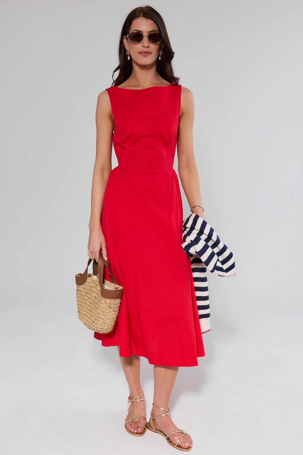Red Boat Neck Midi Dress styled with straw bag and striped jacket - Full Length On Model | Avara
