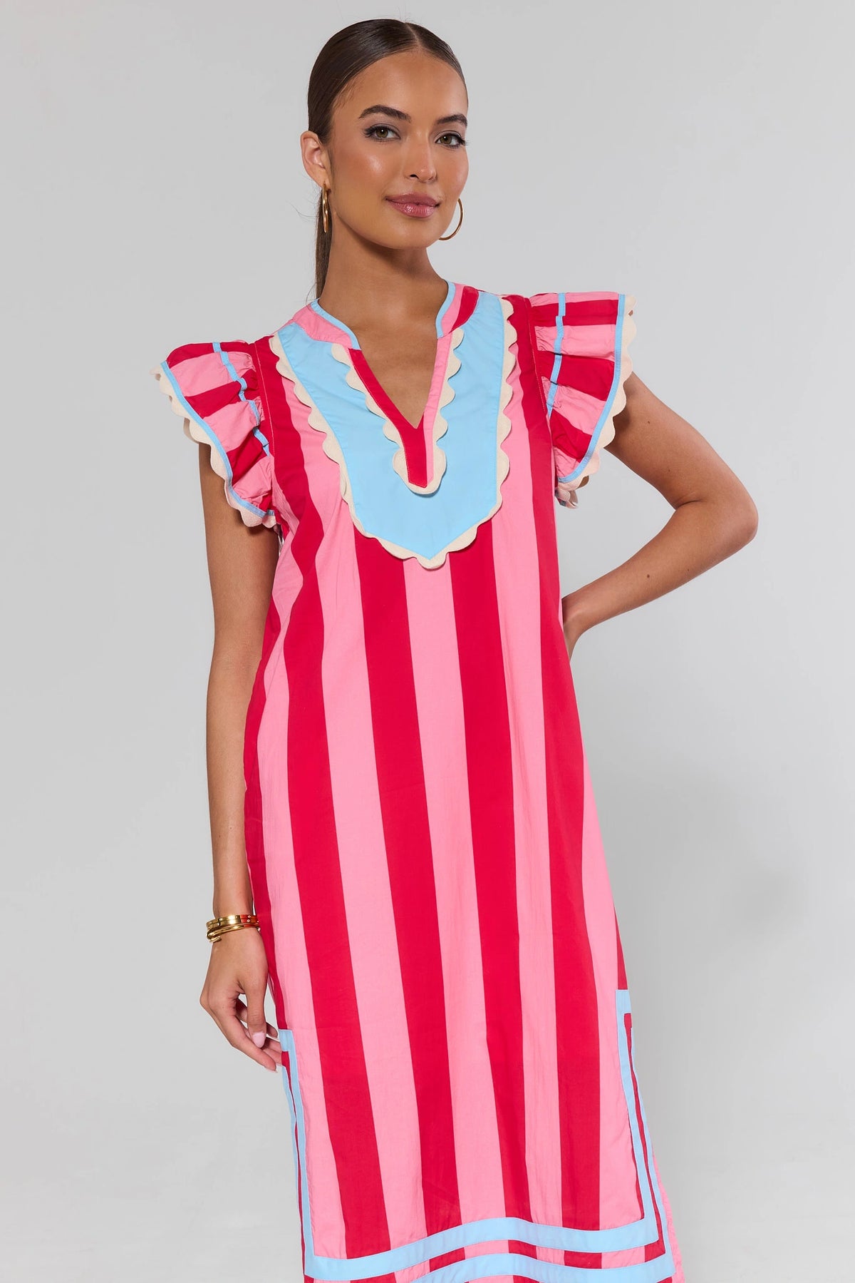Pink Striped Midi Dress by THML with blue scallop neckline and ruffle sleeves - Front Angle | Avara