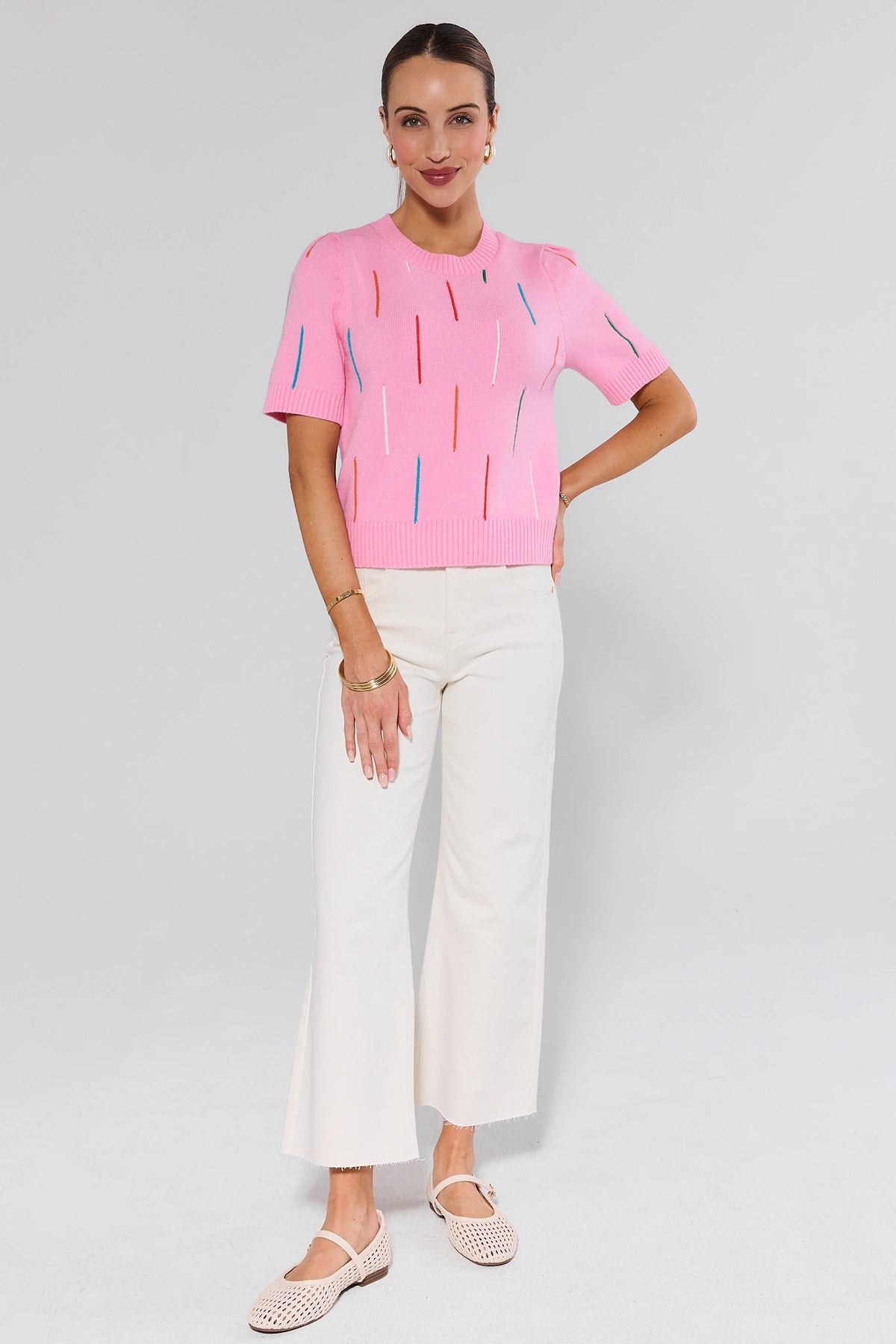 Pink Knit Embroidered Top styled with white wide-leg pants - Full Length Front View, modest spring top | Avara