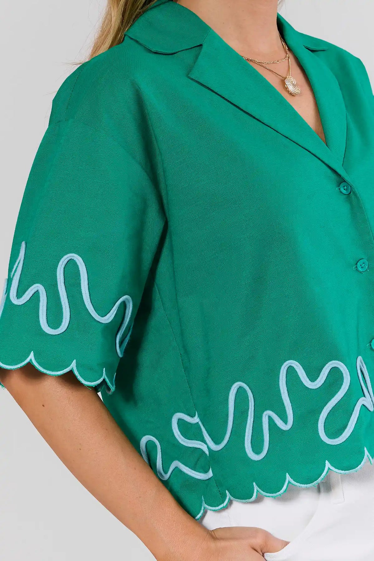 Green Scalloped Trim Top embroidered hem and scallop trim close-up detail - On Model | Avara
