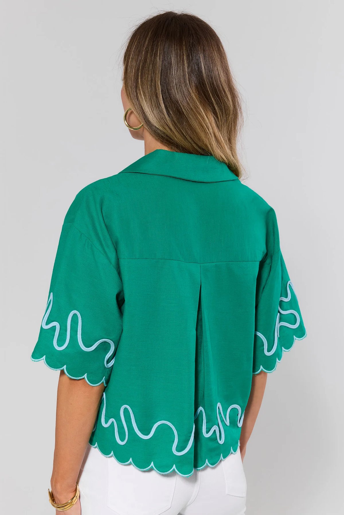Green Scalloped Trim Top scalloped hem and embroidery detail - Back View on Model | Avara